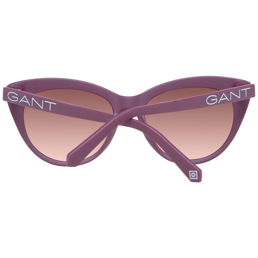 Gant purple women's sunglasses with cat-eye style, full-rim, brown lenses, plastic frame, UV protection, includes branded case.