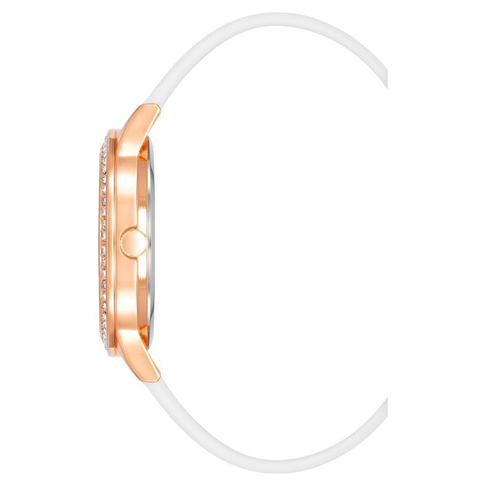 Side view of Juicy Couture Rose Gold Women's watch with white silicone strap and rhinestone-studded case.