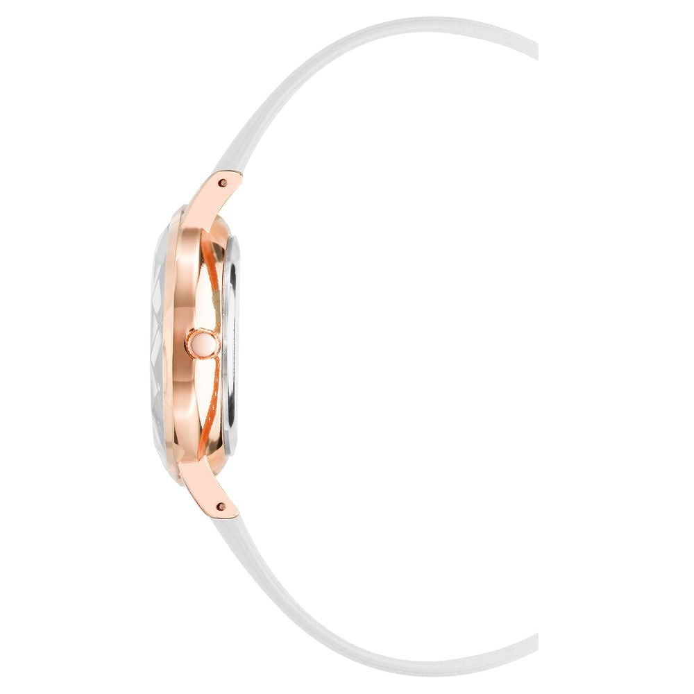 Side view of Juicy Couture rose gold women's watch with white leatherette strap, showcasing elegant design and analog quartz clockwork.
