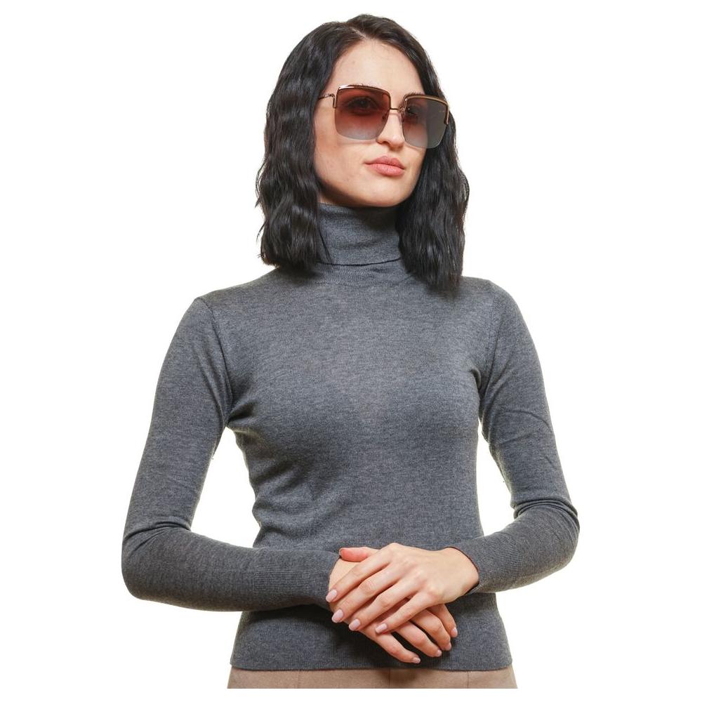 Woman wearing Emilio Pucci Bronze Square Sunglasses with Multicolor Gradient Lenses, showing stylish metal frame for UVA & UVB protection.