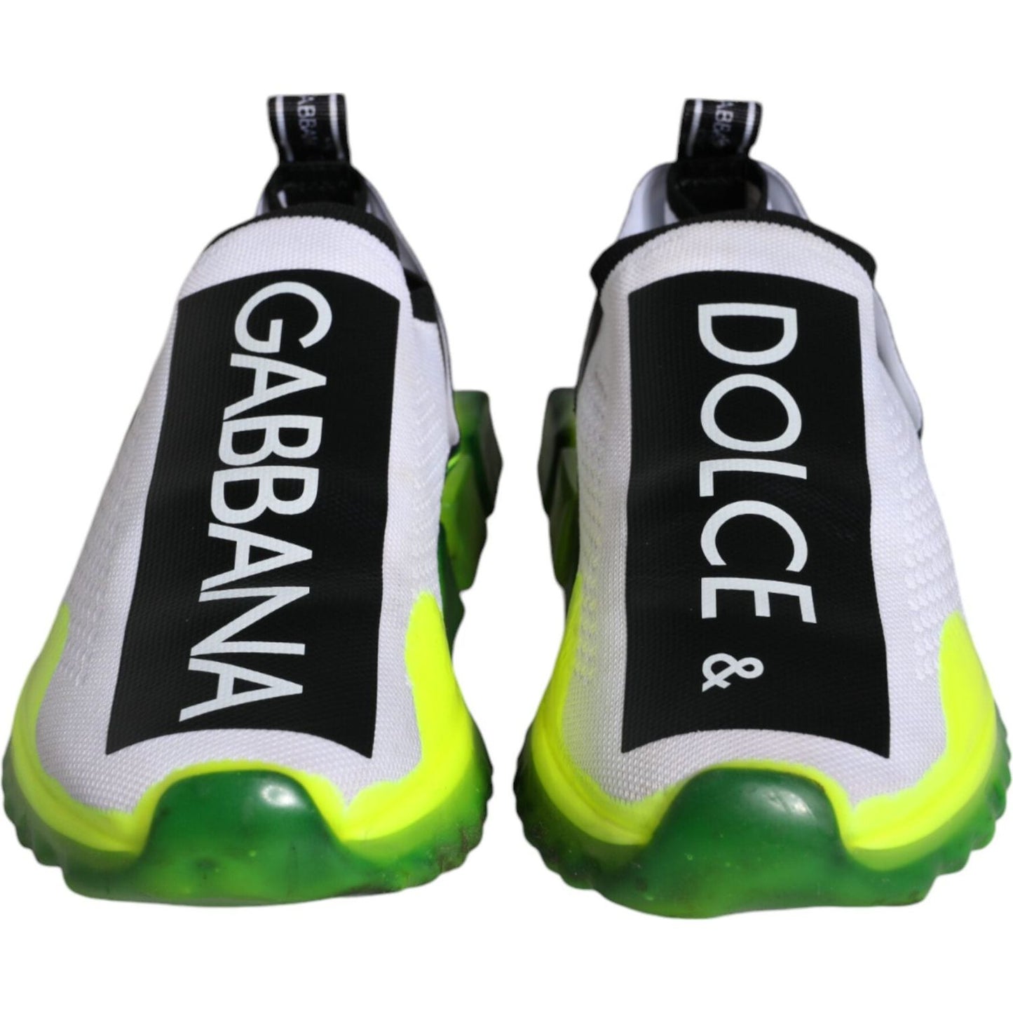 Dolce & Gabbana white yellow Sorrento sneakers with logo print, fabric pull strap, and black rubber sole.