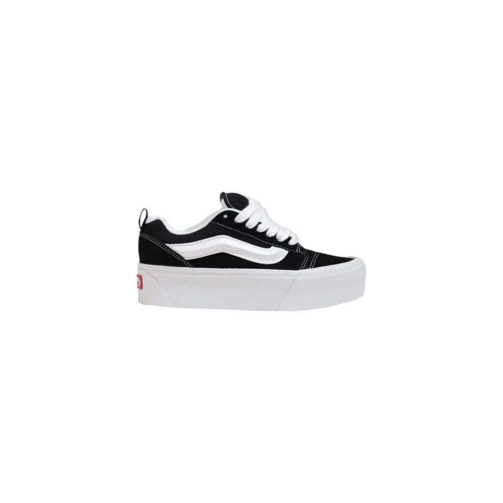 Vans black and white women's suede leather sneaker, part of the fall/winter collection.