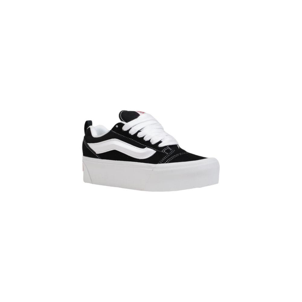 Vans women's black and white suede leather sneakers, Fall/Winter collection, stylish platform design with white laces.