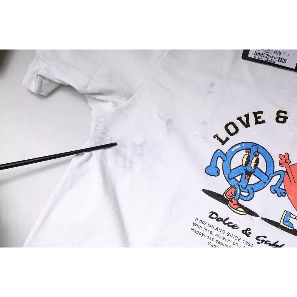 Close-up of Dolce & Gabbana White Love & Peace T-shirt with blue graphic, highlighting minor discoloration on front.