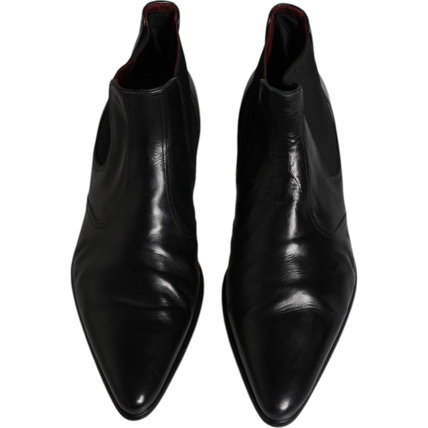 Top view of Dolce & Gabbana men's black leather Chelsea ankle boots with stretch bands for easy entry, featuring sleek design and logo detail.