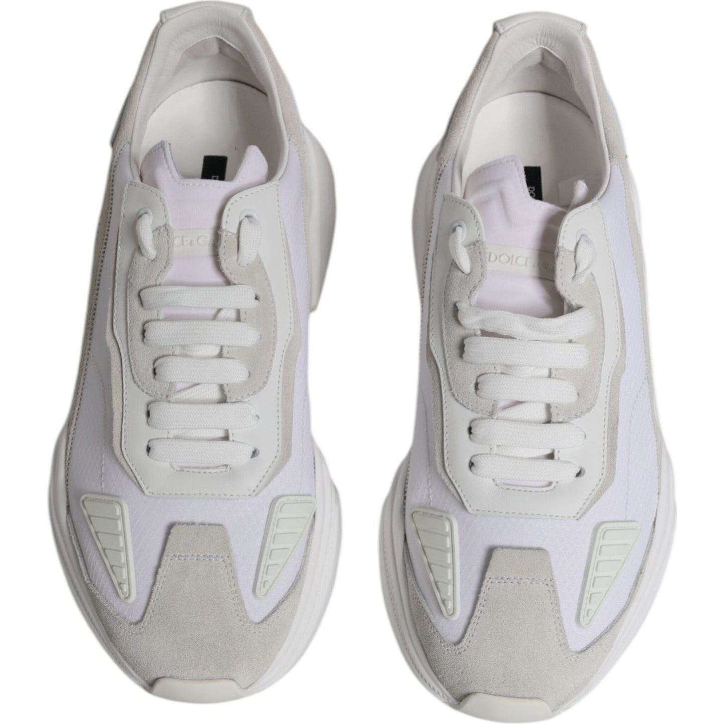 Dolce & Gabbana Daymaster white leather low-top sneakers with rubber sole and logo details, Italian craftsmanship, minor marks.