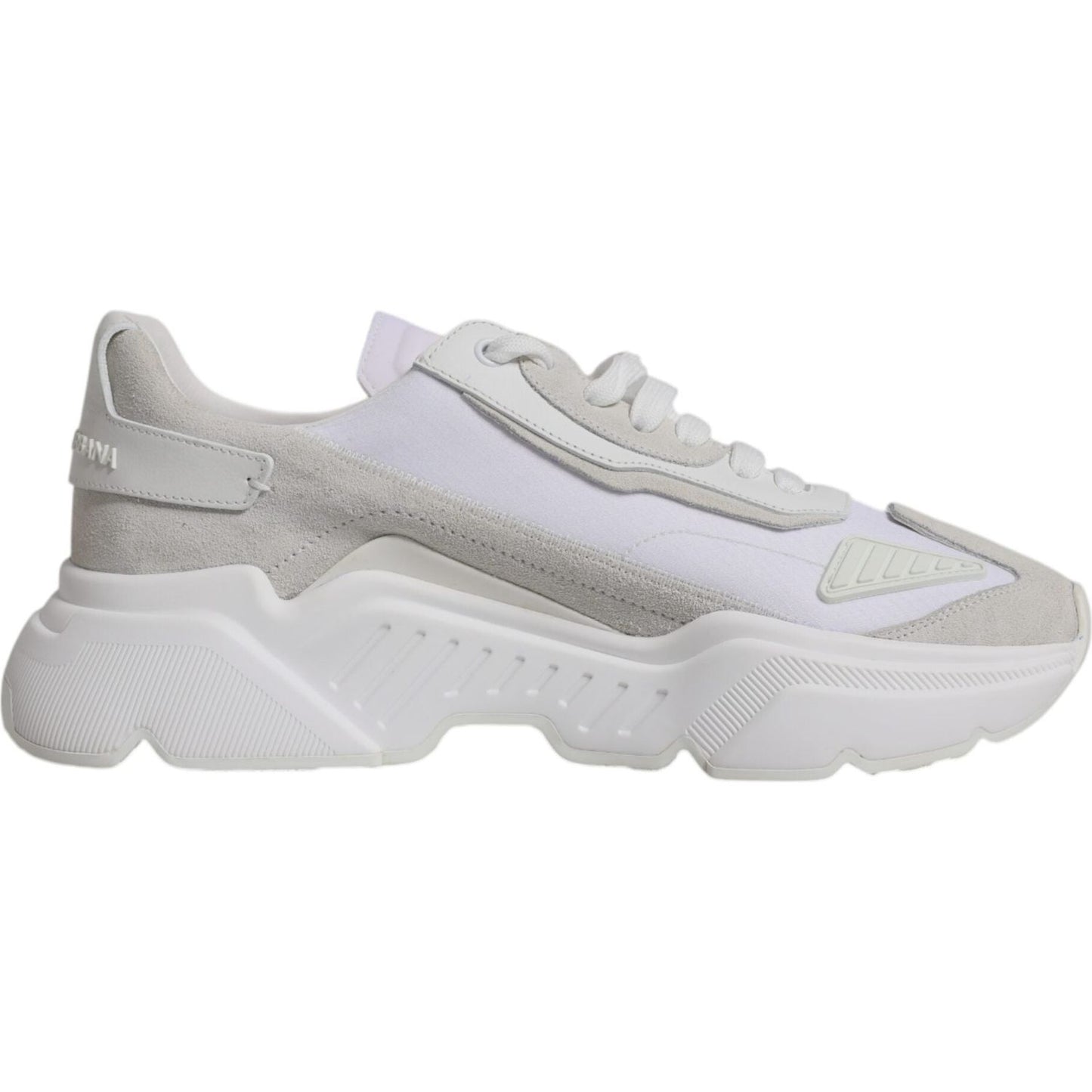 Dolce & Gabbana Daymaster white leather low-top sneakers with rubber sole and lace-up closure, featuring logo details, crafted in Italy.