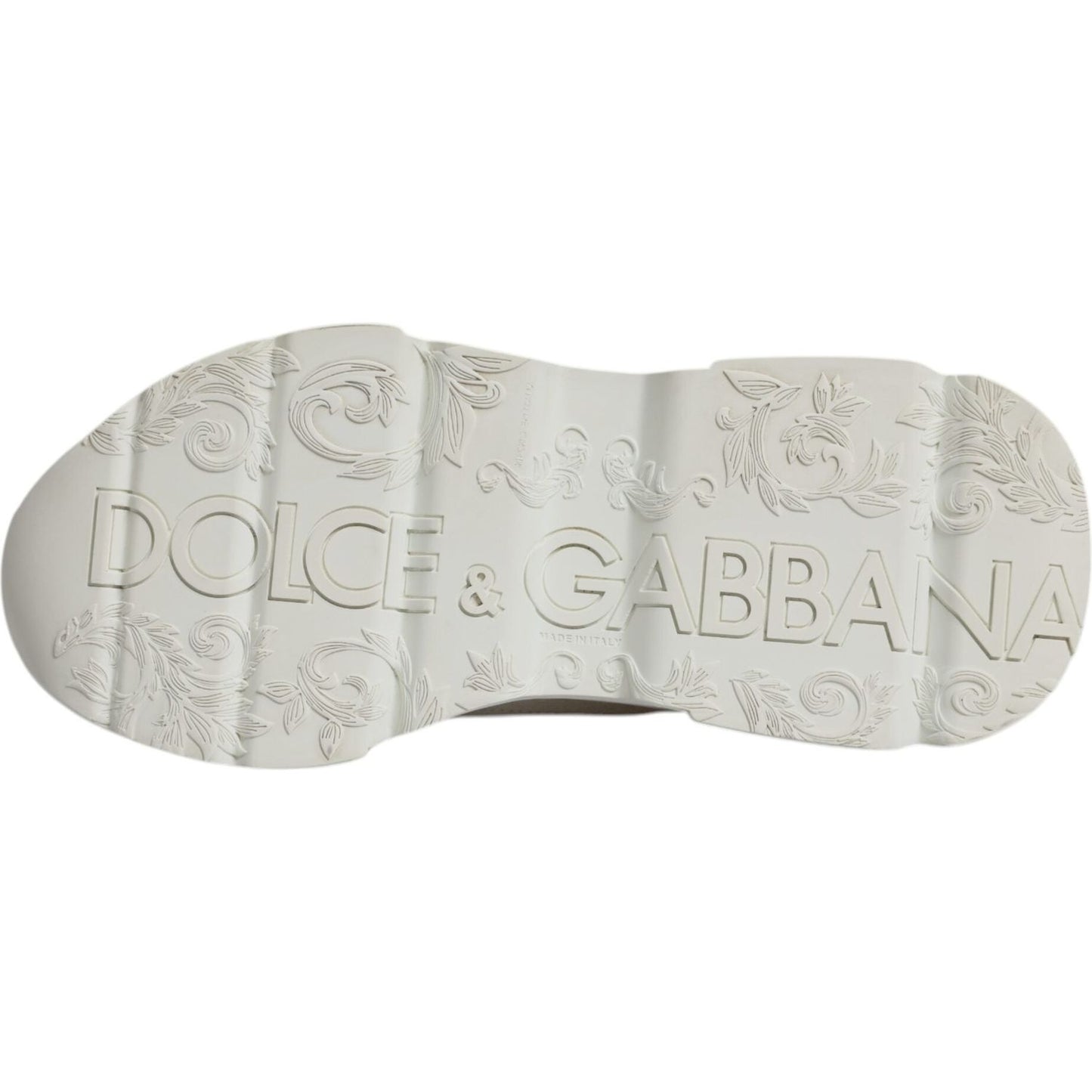 Bottom view of Dolce & Gabbana Daymaster white leather sneaker, showcasing embossed logo on rubber sole.