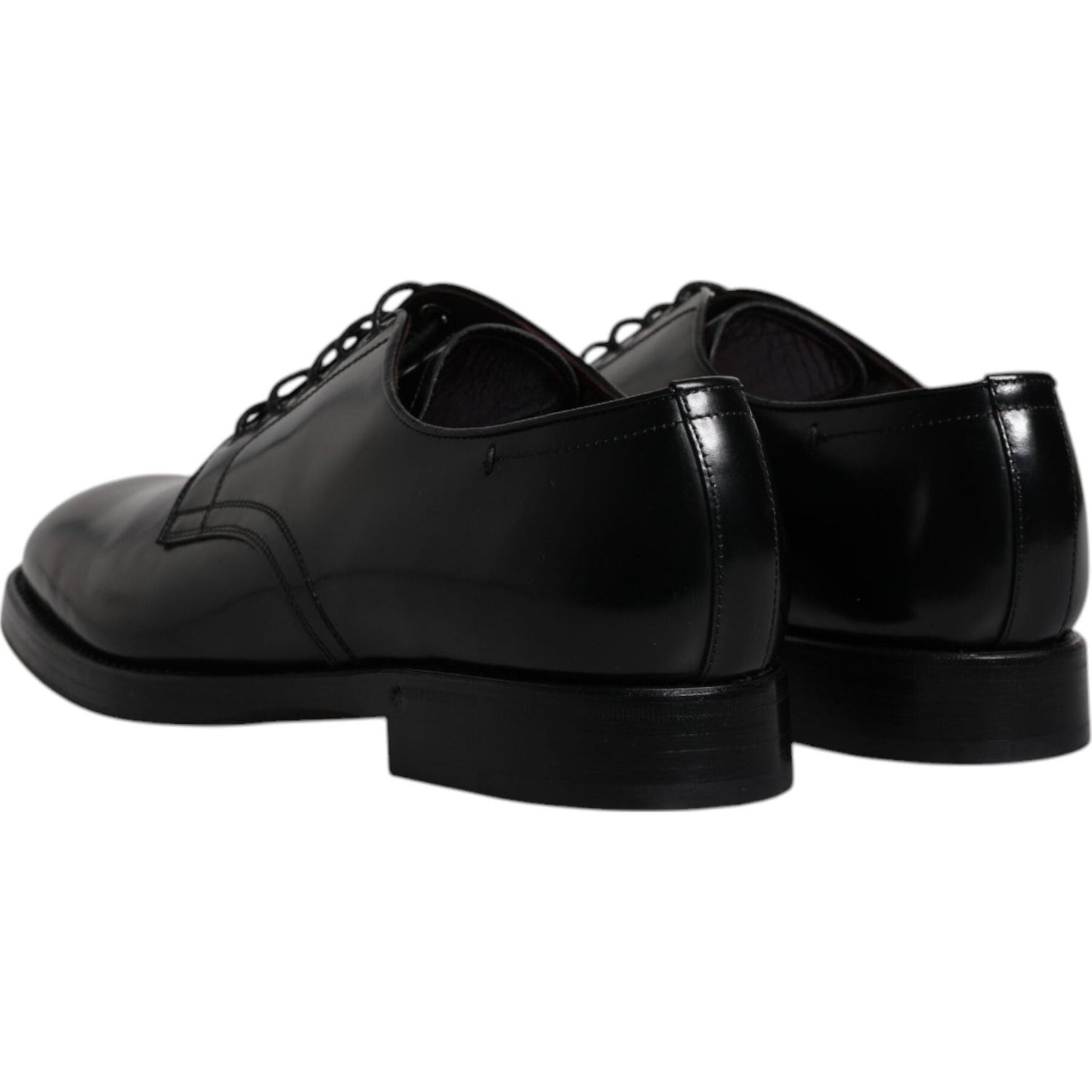 Dolce & Gabbana black leather lace-up Derby formal men's shoes, rear view showcasing sleek design and craftsmanship, made in Italy.