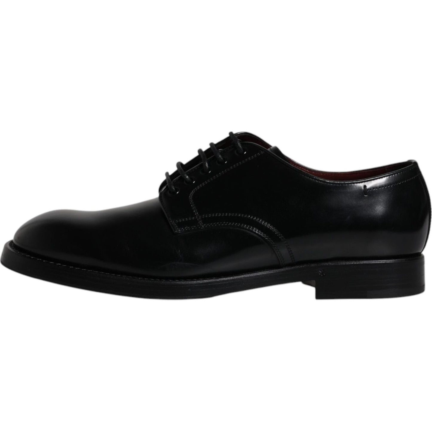 Dolce & Gabbana black leather lace-up Derby formal men's shoes, crafted in Italy, featuring luxurious calf leather and subtle logo details.