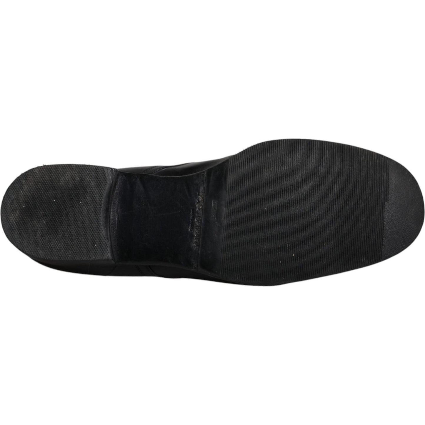 Sole of Dolce & Gabbana black calf leather derby dress shoe for men, showing minor wear marks.