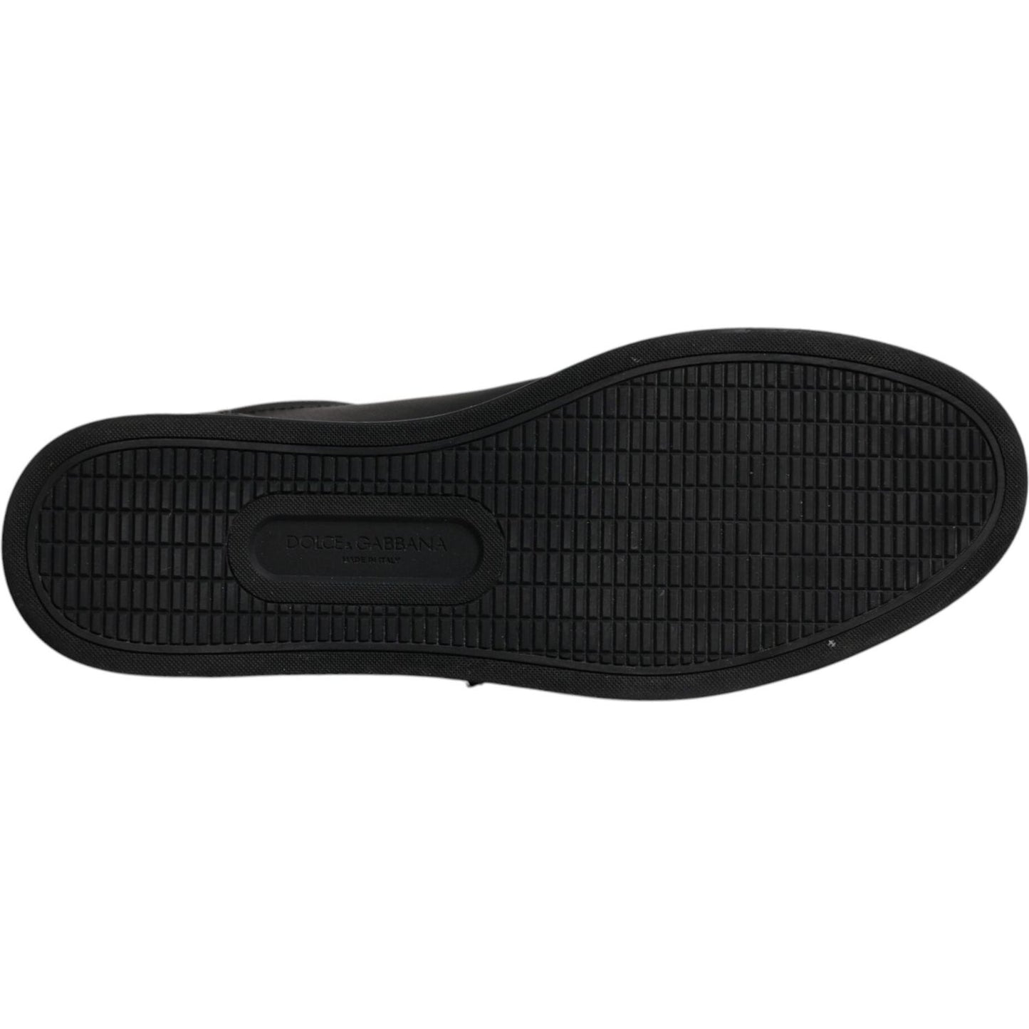 Sole view of Dolce & Gabbana London Heart men's sneakers in black leather with rubber sole, showcasing handcrafted design and logo detail.
