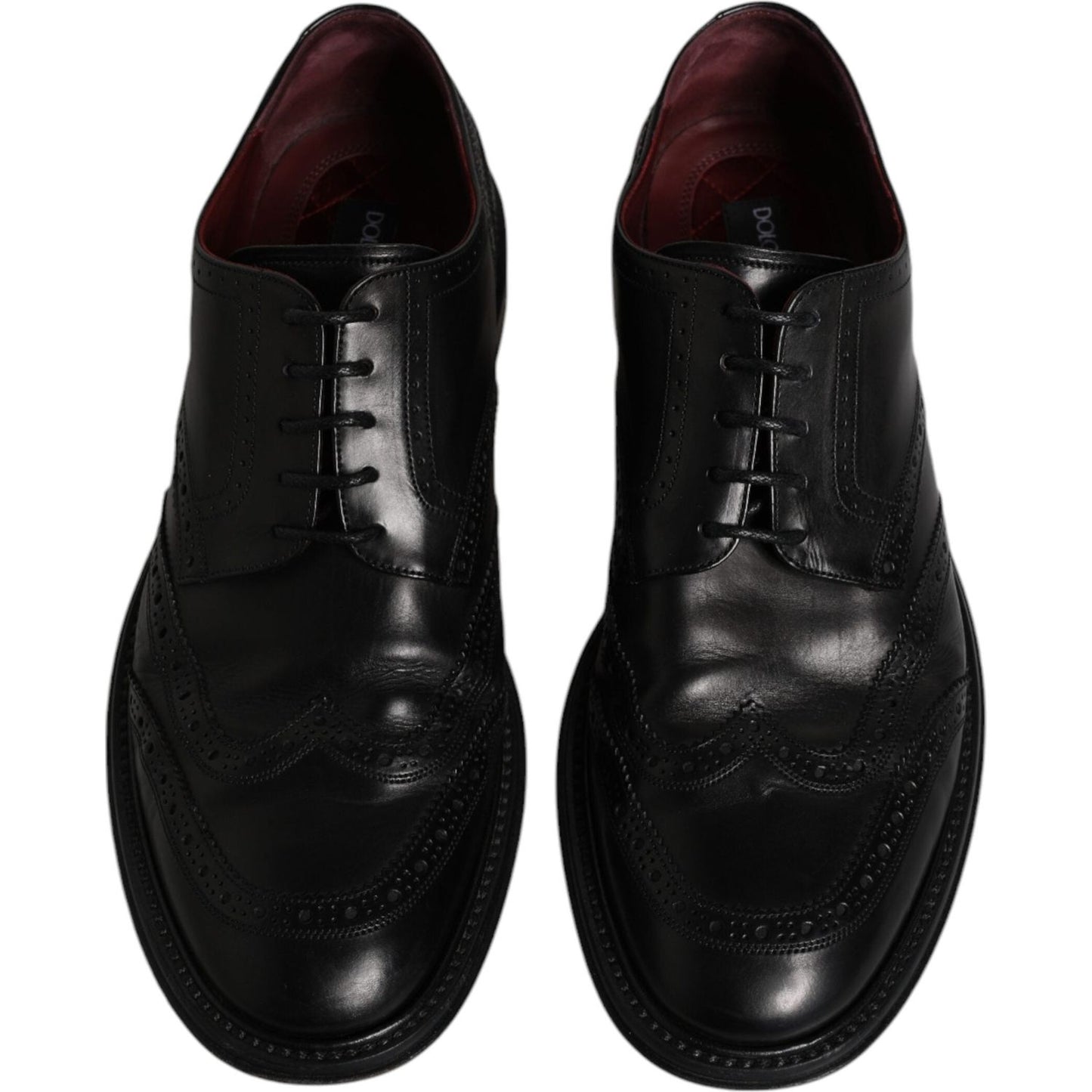 Dolce & Gabbana black leather Derby wingtip formal shoes with lace-up closure, made in Italy, preowned with high craftsmanship.