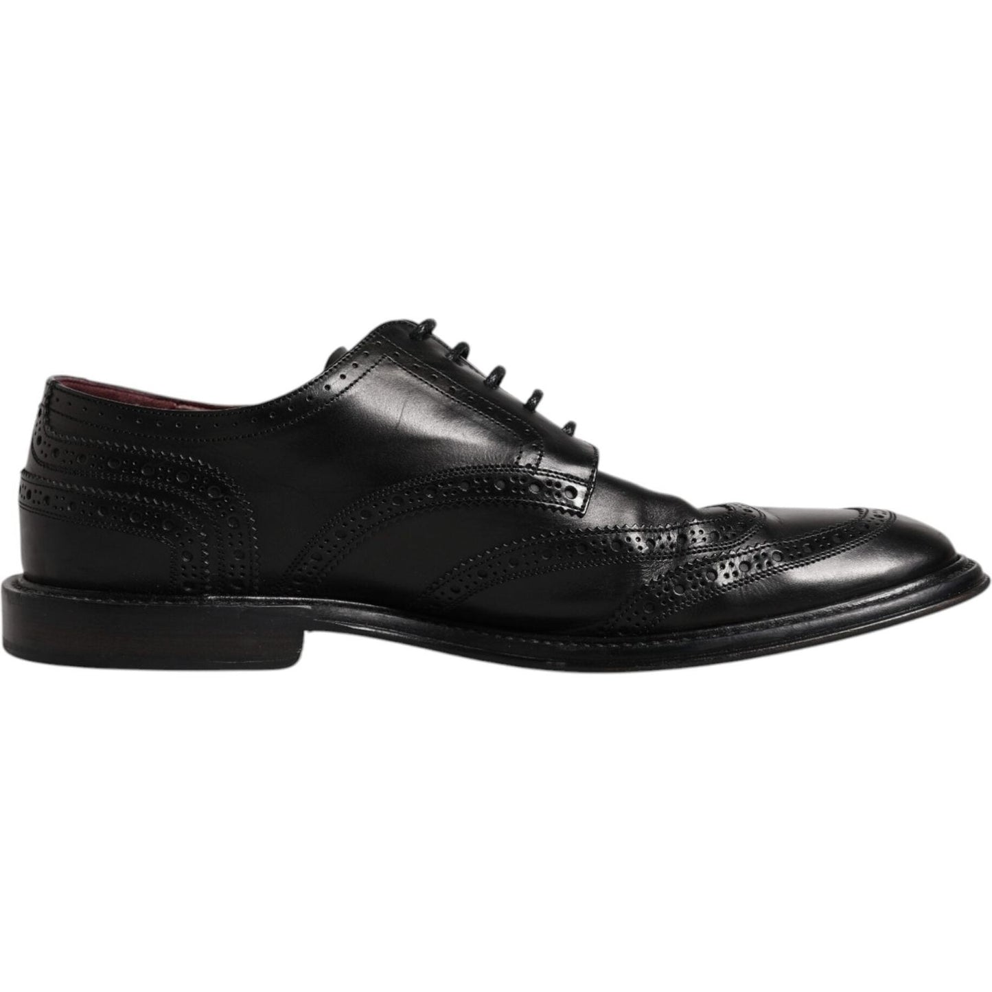 Dolce & Gabbana black leather derby wingtip formal shoe, preowned, with lace-up closure and leather sole, made in Italy.