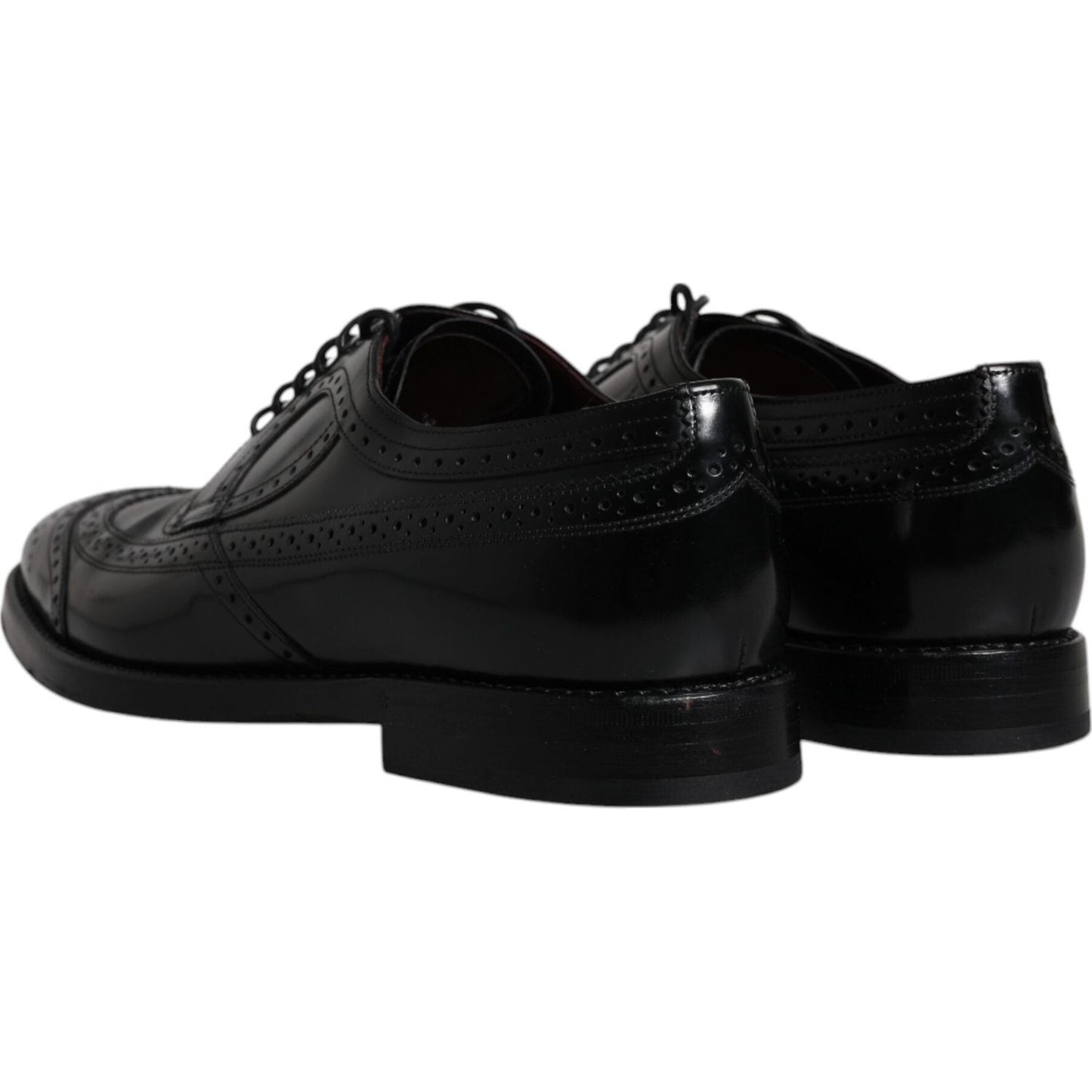 Dolce & Gabbana black leather derby wingtip formal shoes, luxury men's footwear with lace-up closure; 100% calfskin, made in Italy.