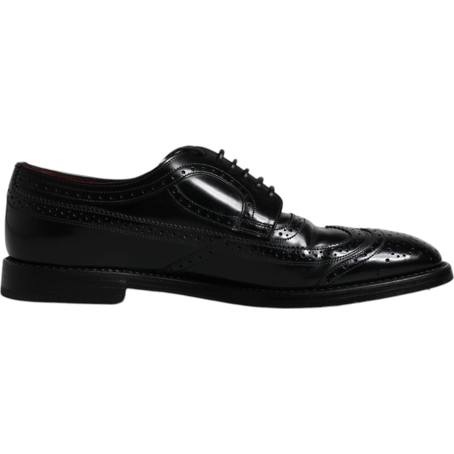 Dolce & Gabbana black leather derby wingtip formal shoes made from calfskin with lace-up closure and logo details, side view.