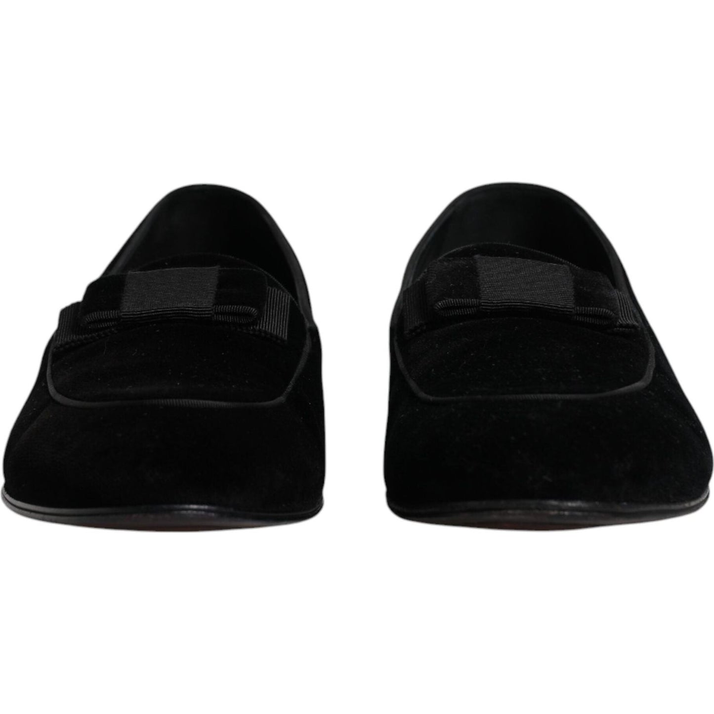 Dolce & Gabbana black velvet loafers for men, featuring high craftsmanship, logo details, and leather outsole. Formal dress shoes from Italy.