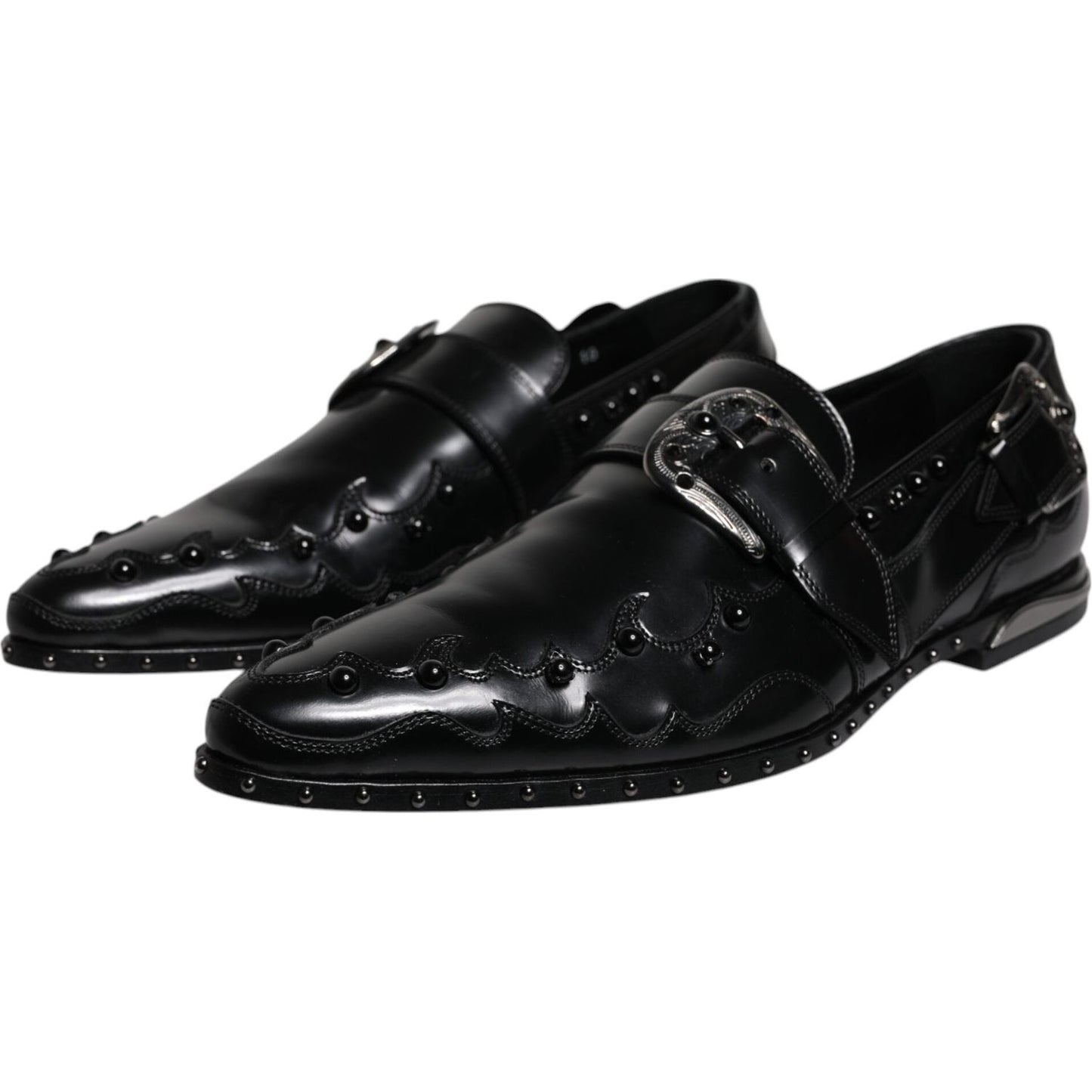 Dolce & Gabbana black embellished derby monk strap shoes, 100% calf leather, elegant design, buckle closure, missing stones on right shoe.