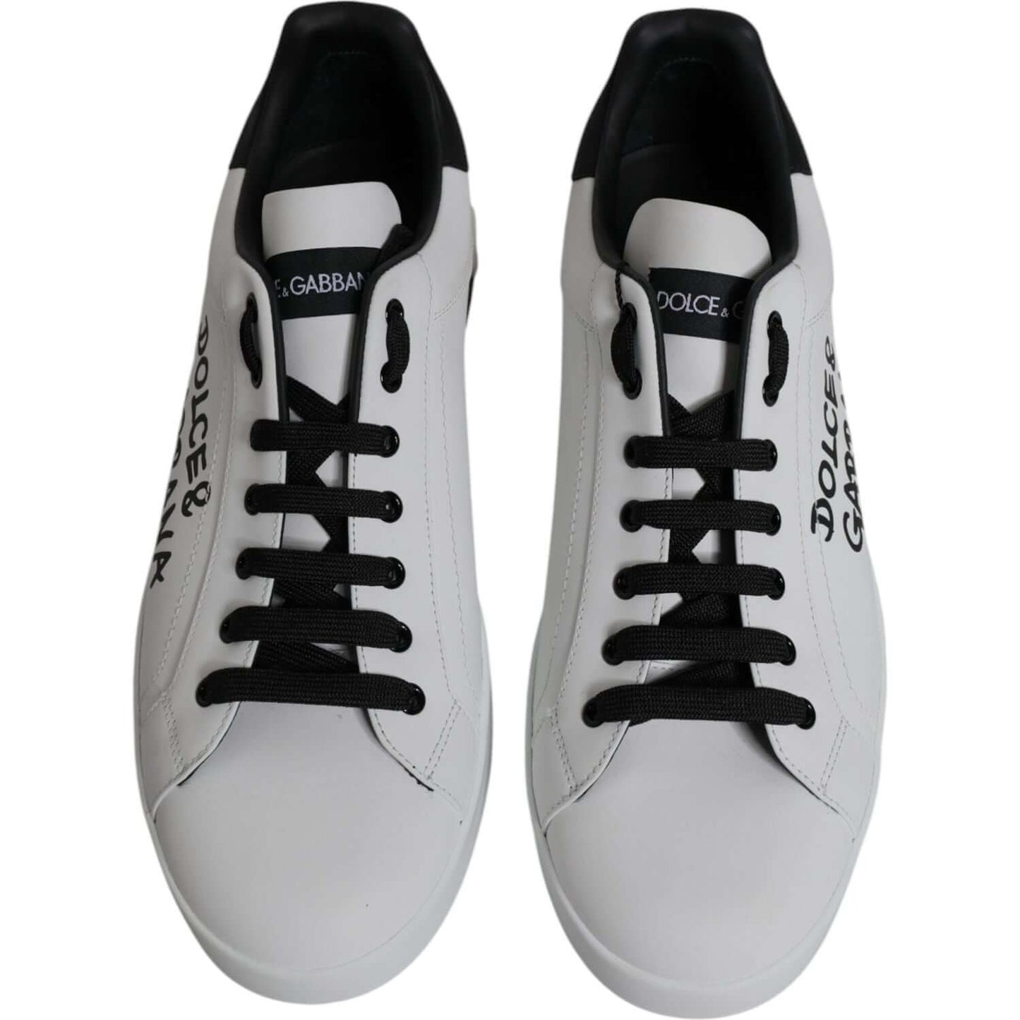 Dolce & Gabbana Portofino sneakers in white calf leather with black lace-up closure, featuring logo details and rubber sole. Made in Italy.