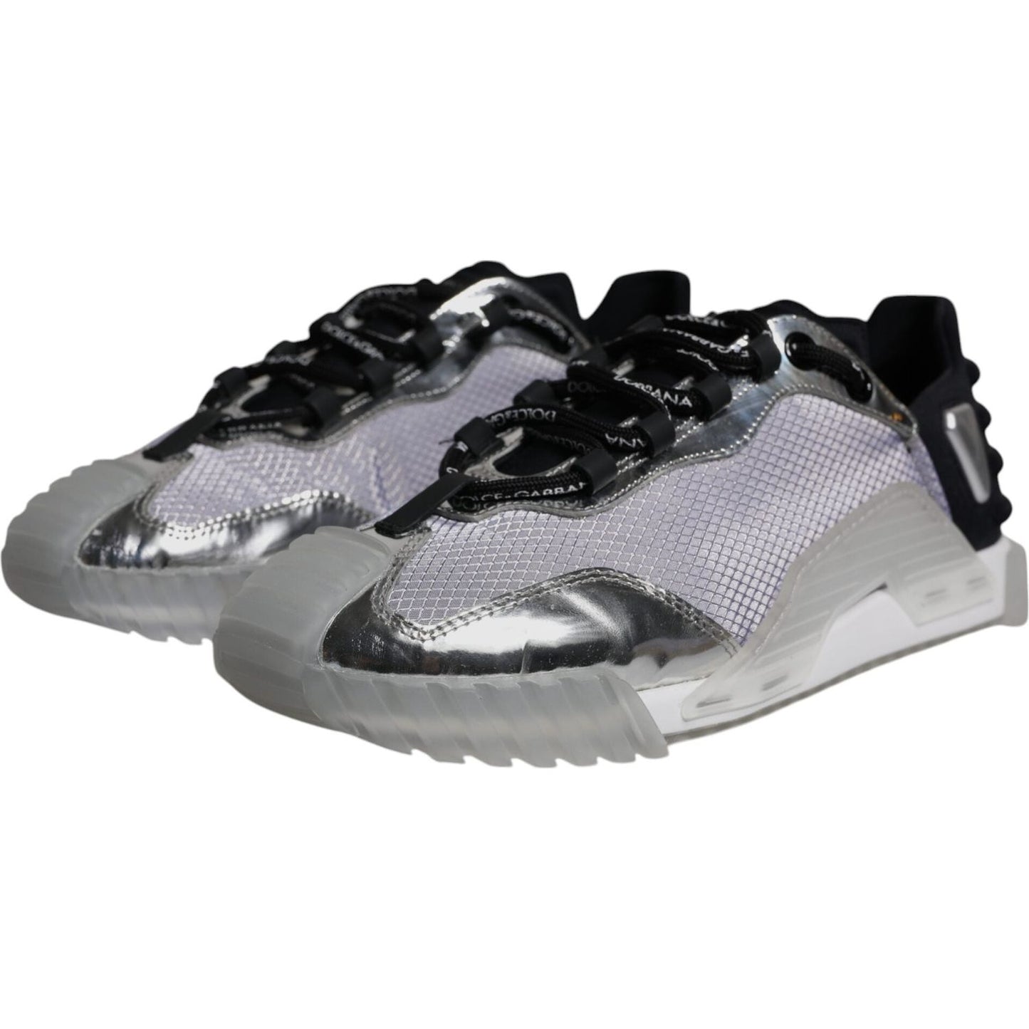 Dolce & Gabbana NS1 low-top sneakers in silver and black, featuring nylon and rubber sole, lace-up closure. Unique design with minor defect on left shoe.