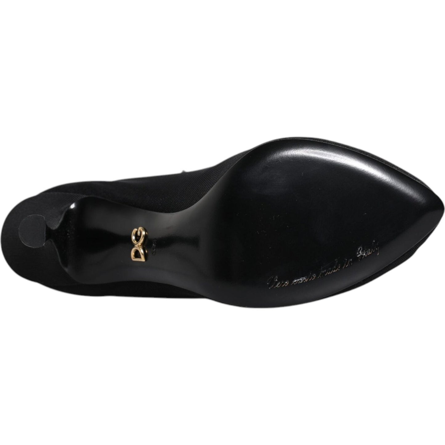 Black leather sole of Dolce & Gabbana sock boots with logo detail and light scratches visible, made in Italy.