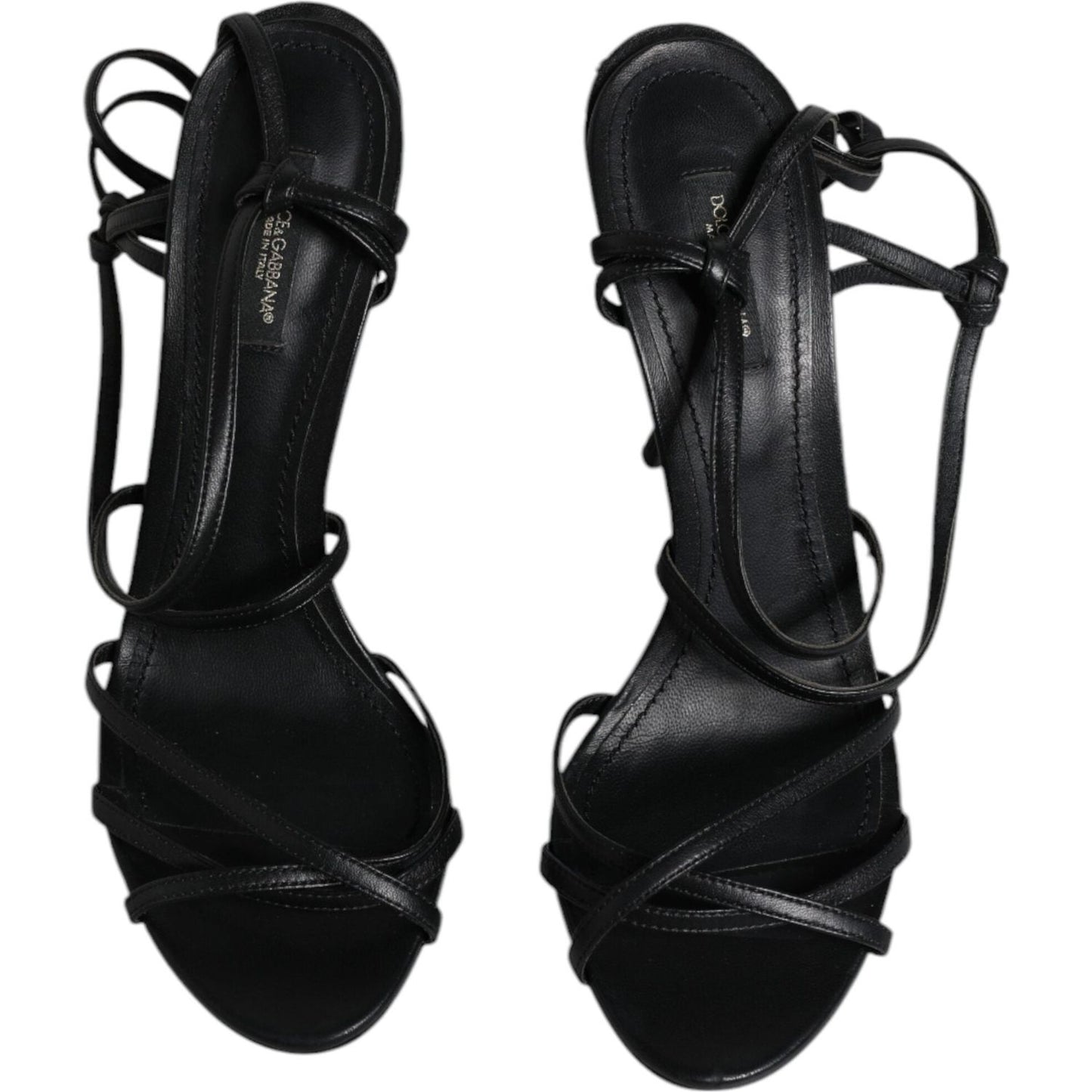 Dolce & Gabbana black leather high heels Keira sandals with tie closure, logo details, and scratch imperfections, top view.