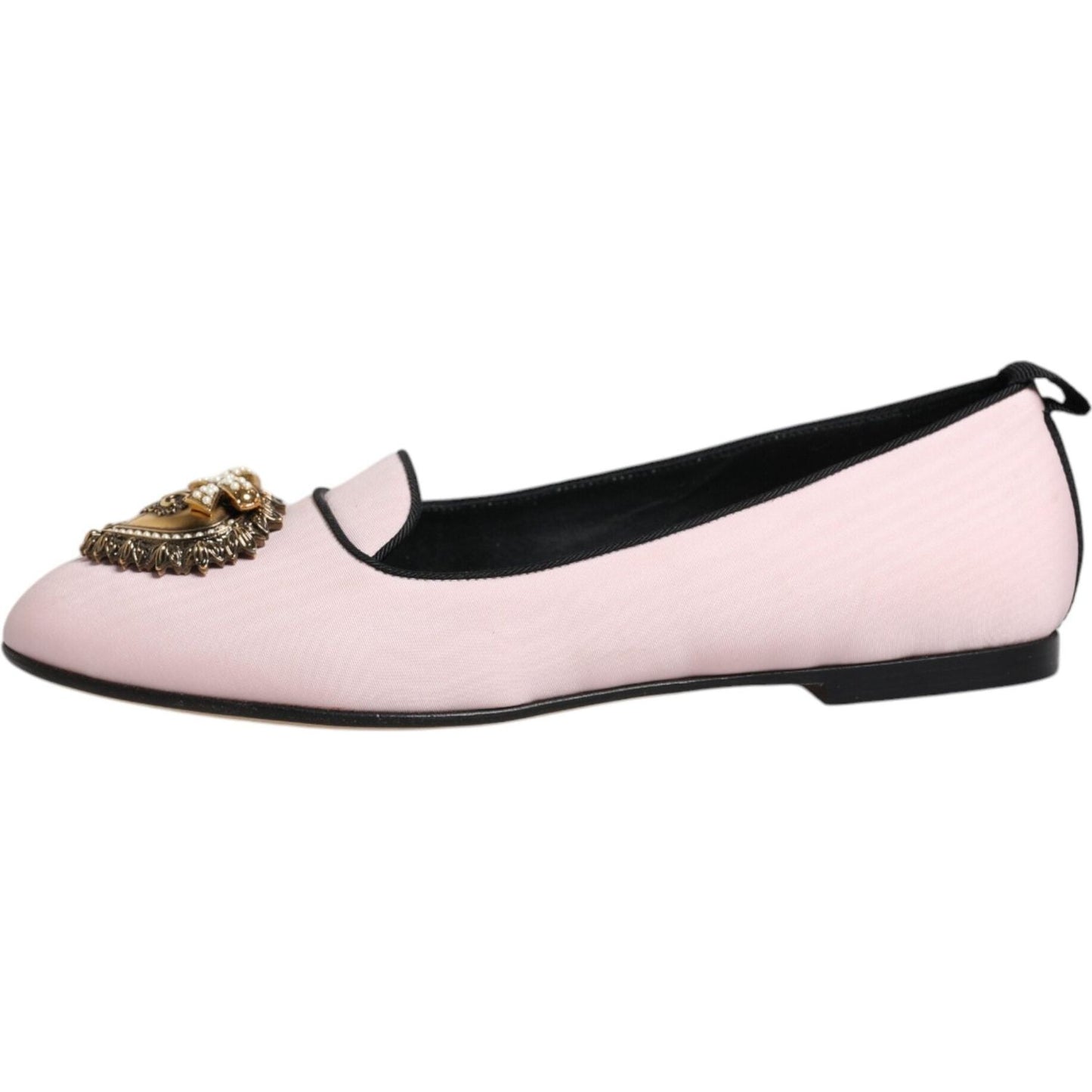 Dolce & Gabbana light pink velvet slip-on loafers with gold heart detail, side view. Made of silk, viscose, cotton, leather sole. Minor marks visible.