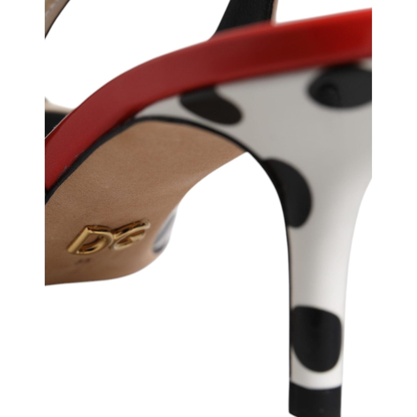 Close-up of Dolce & Gabbana multicolor slingback heels with polka dots, logo detail, and luxury leather for high fashion enthusiasts.