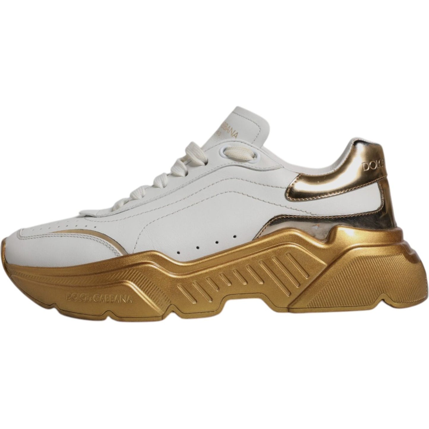 Dolce & Gabbana white gold Daymaster low-top sneakers in calf leather with rubber sole, stylish and comfortable luxury footwear.
