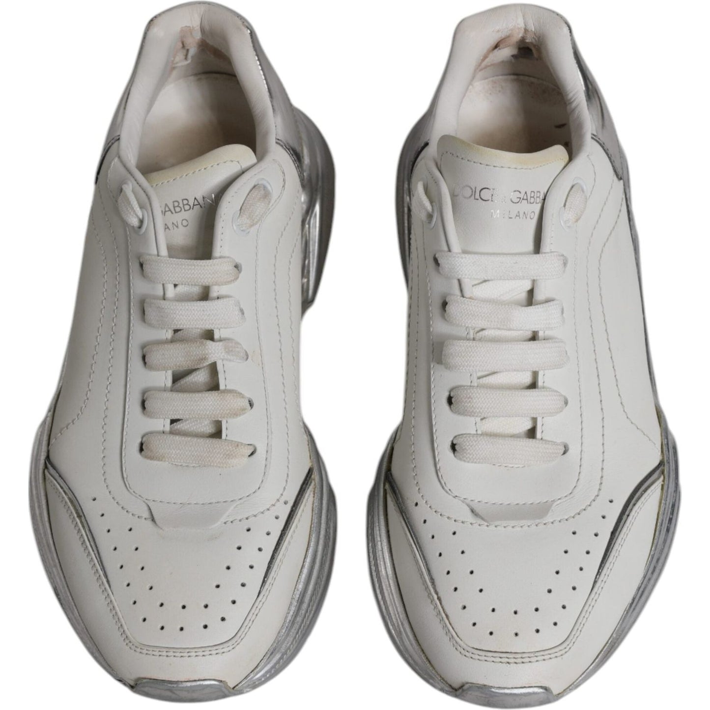 Dolce & Gabbana Daymaster white silver low-top sneakers, calf leather, lace-up closure, slightly preowned with tags, logo detail, made in Italy.