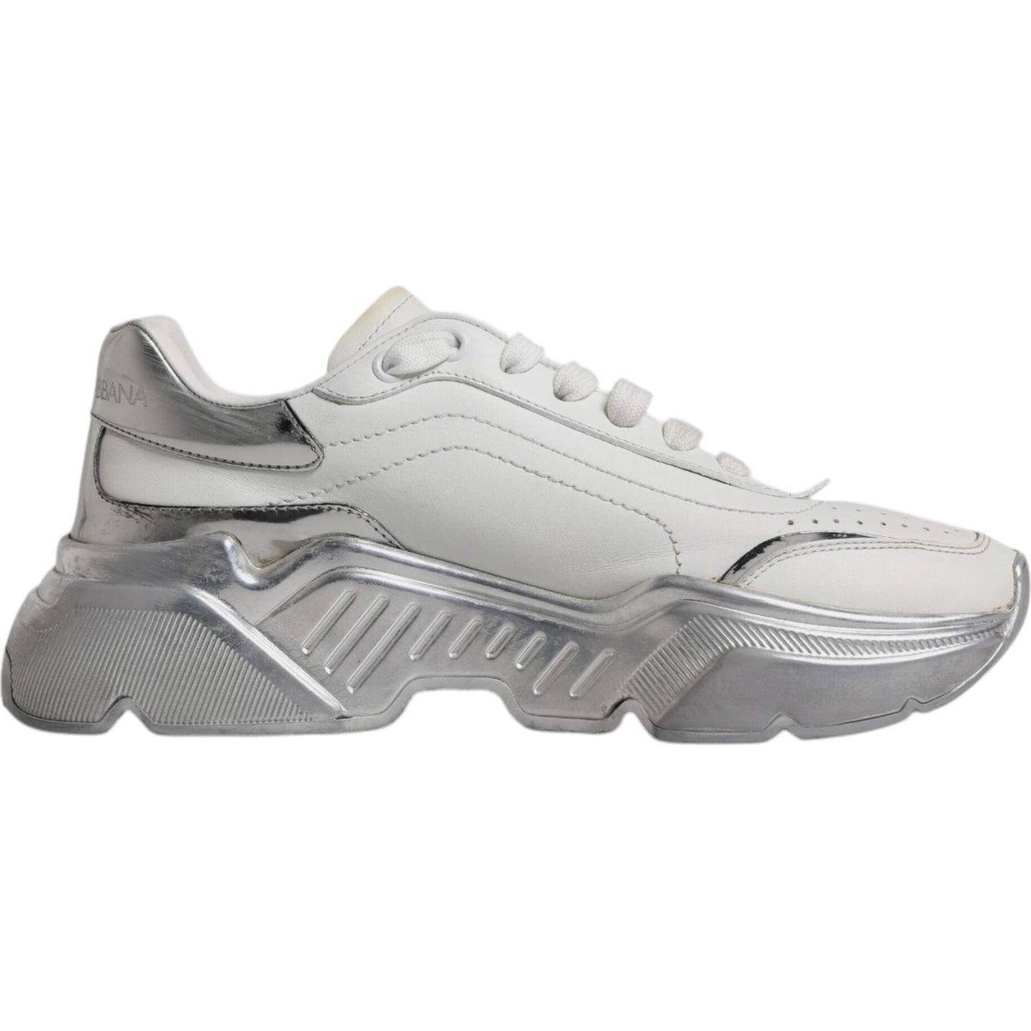 Dolce & Gabbana white silver Daymaster low-top sneakers with lace-up closure and logo details, made of calf leather and rubber soles.
