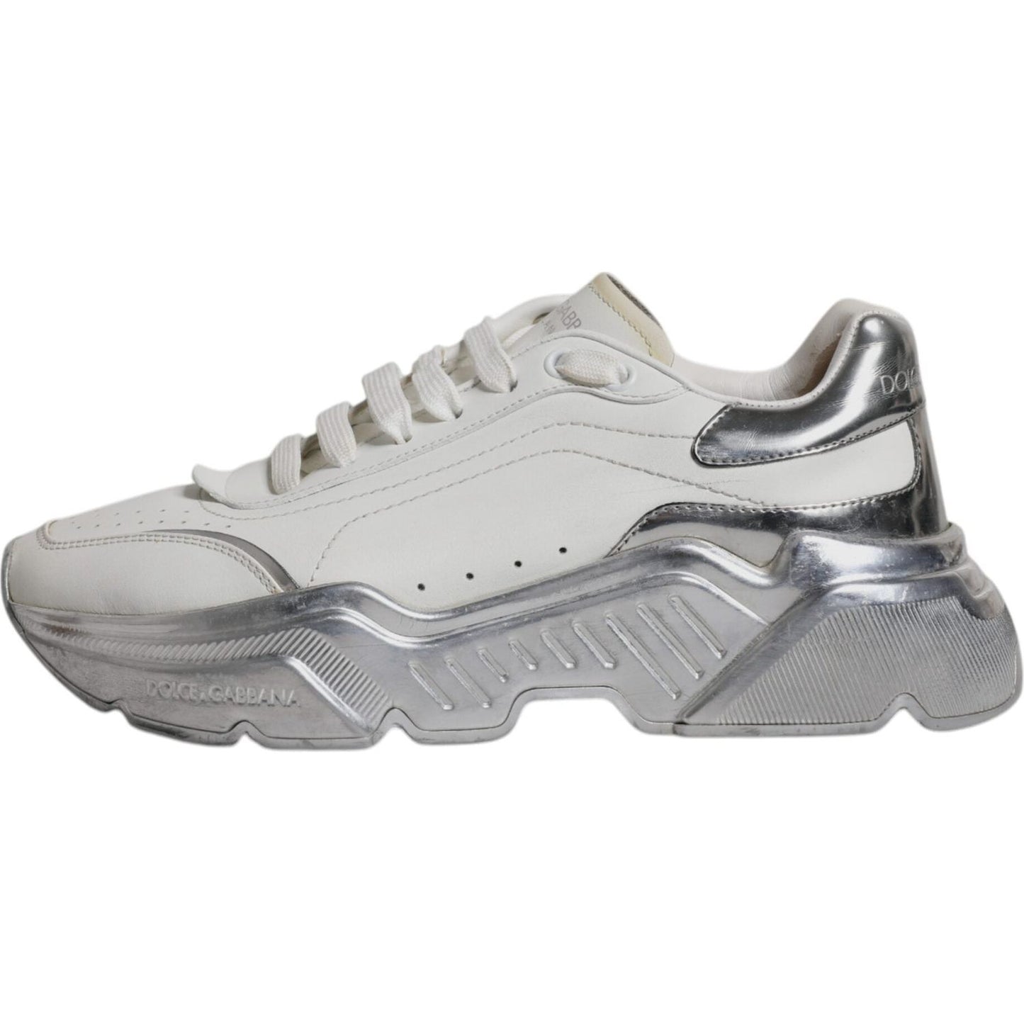 Dolce & Gabbana Daymaster white silver low-top sneakers with rubber sole and lace-up closure.