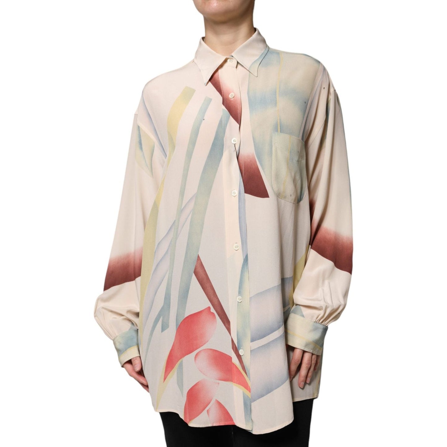 Etro beige printed collared silk blouse with long sleeves and button closure, showing colorful abstract design, made in Italy.