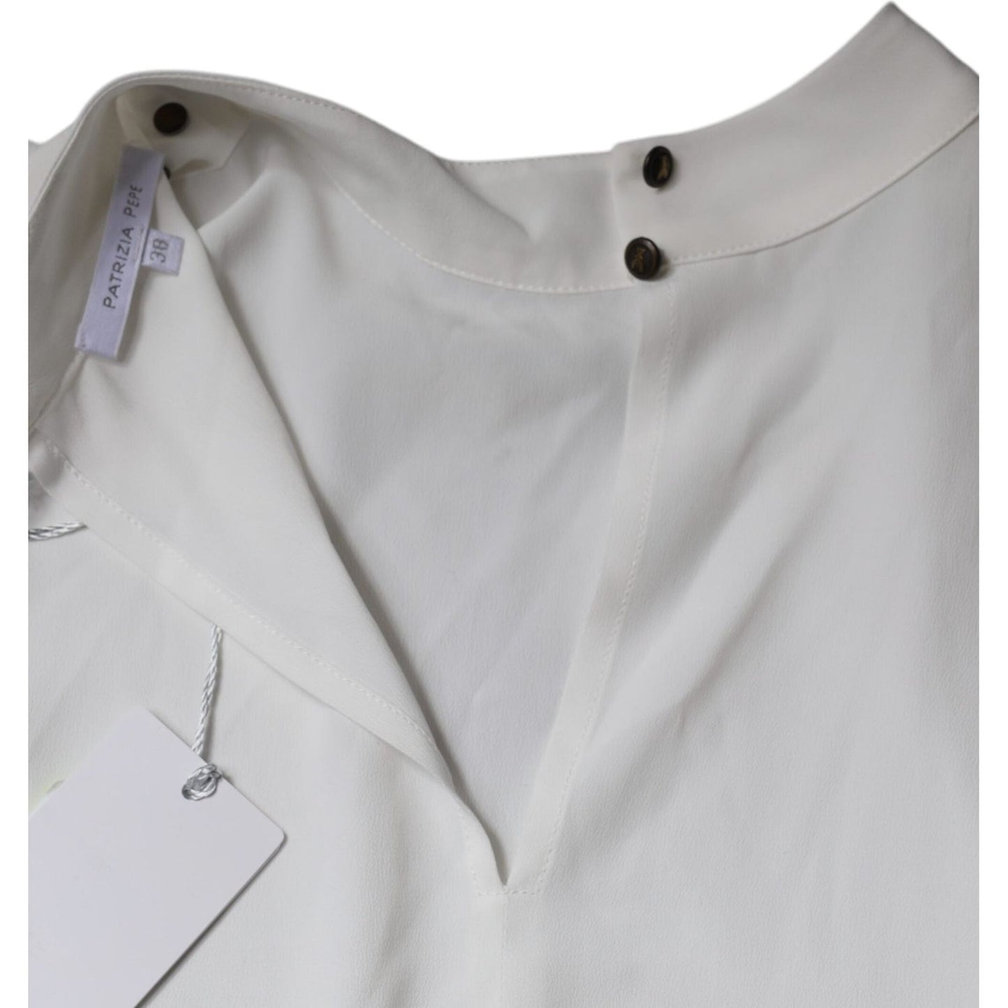 Patrizia Pepe white mock neckline sleeveless tank blouse with button closure and logo tag, featuring minor stains on the front.