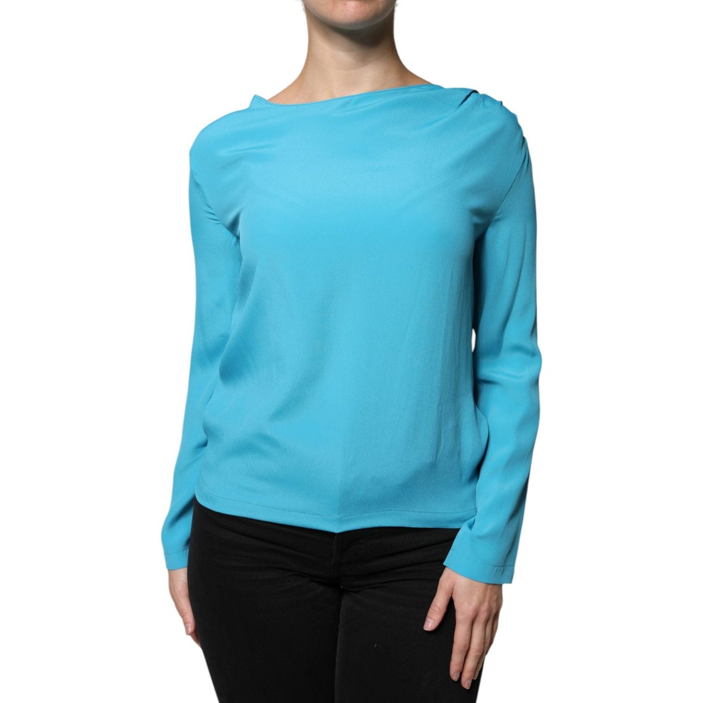 Boutique Moschino blue round neckline long sleeves blouse top with back button closure and minor defects.
