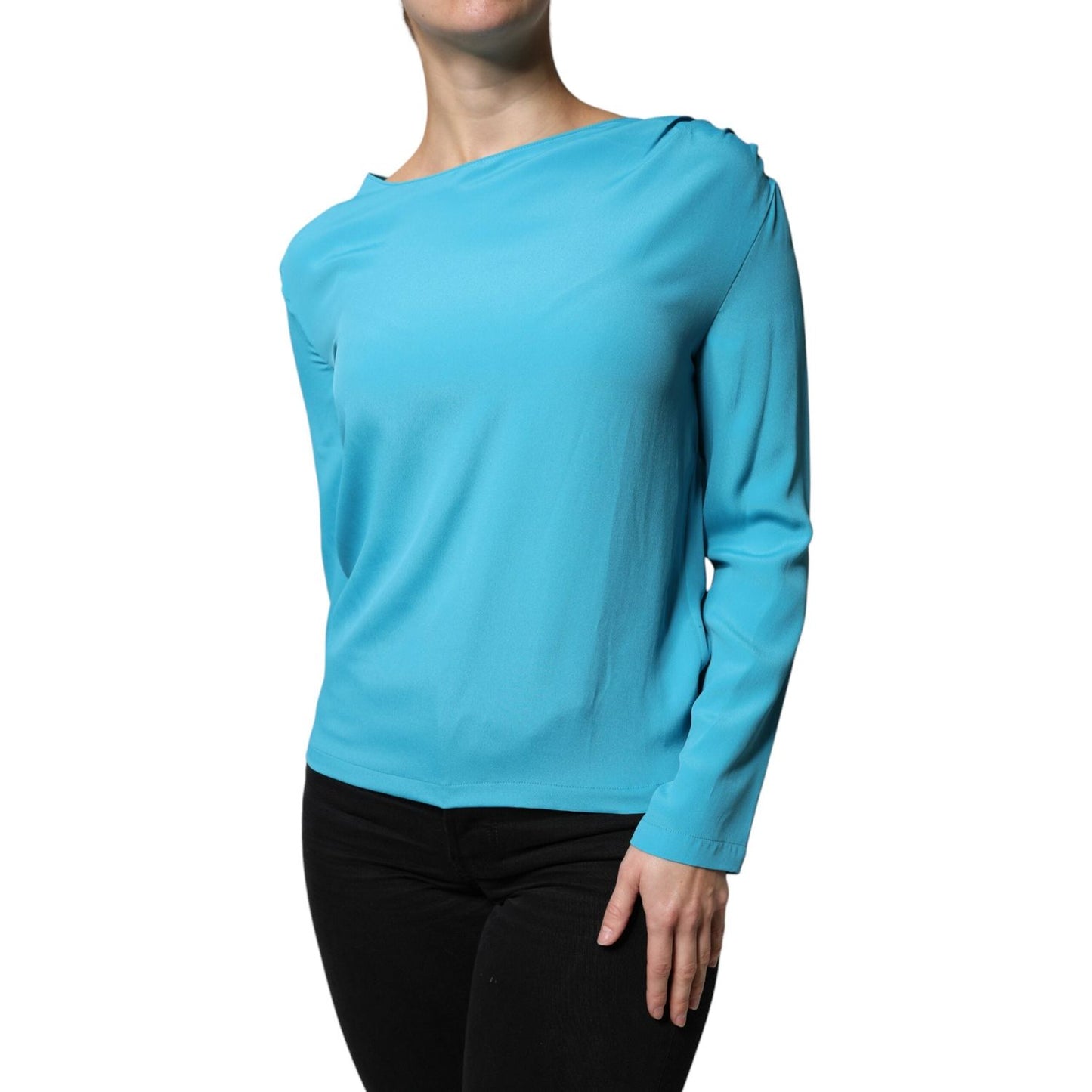 Boutique Moschino blue round neckline long sleeves blouse top with back button closure, minor defect with pulled threads, logo detail