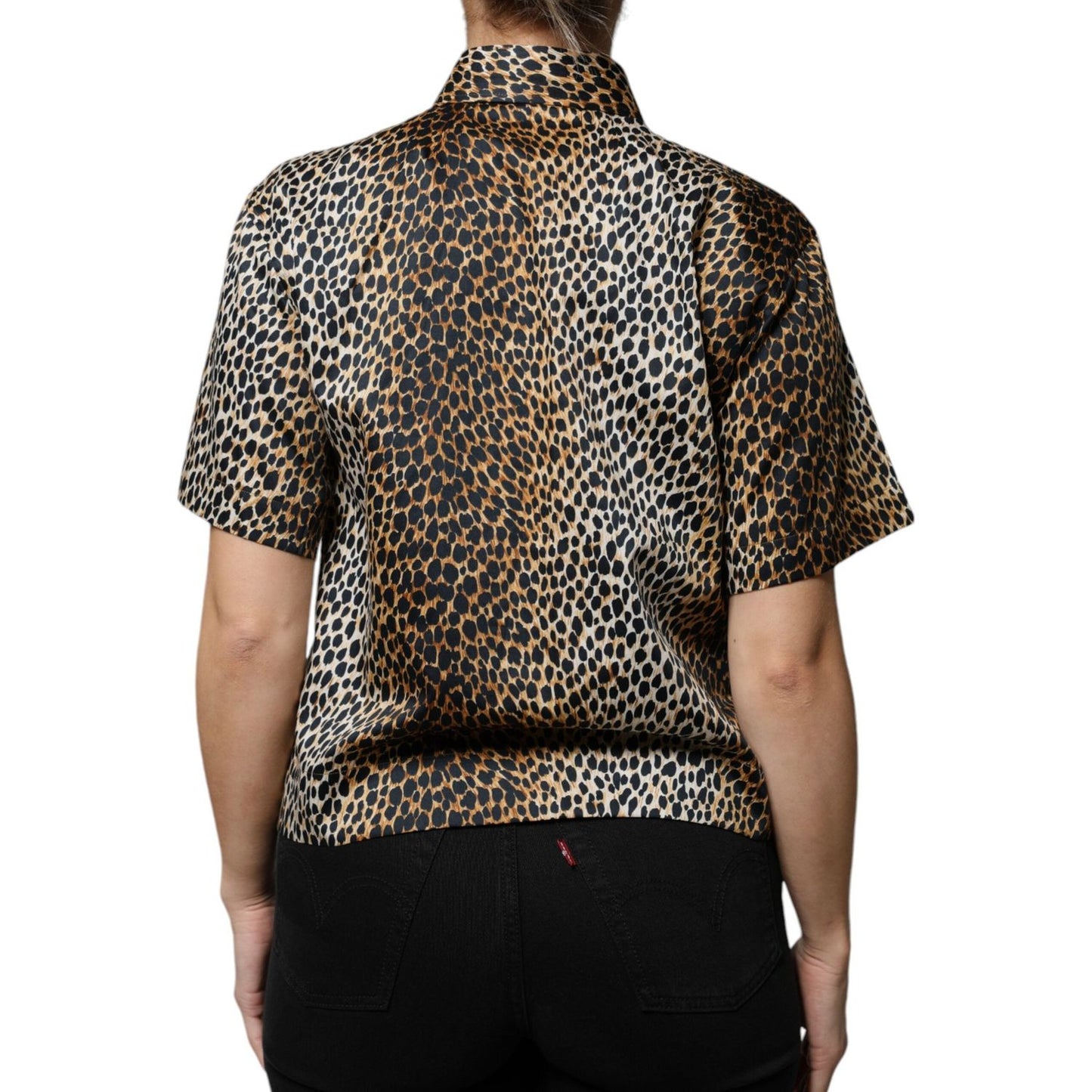 Back view of Dolce & Gabbana brown leopard print short sleeve blouse with button closure and minor front stains.
