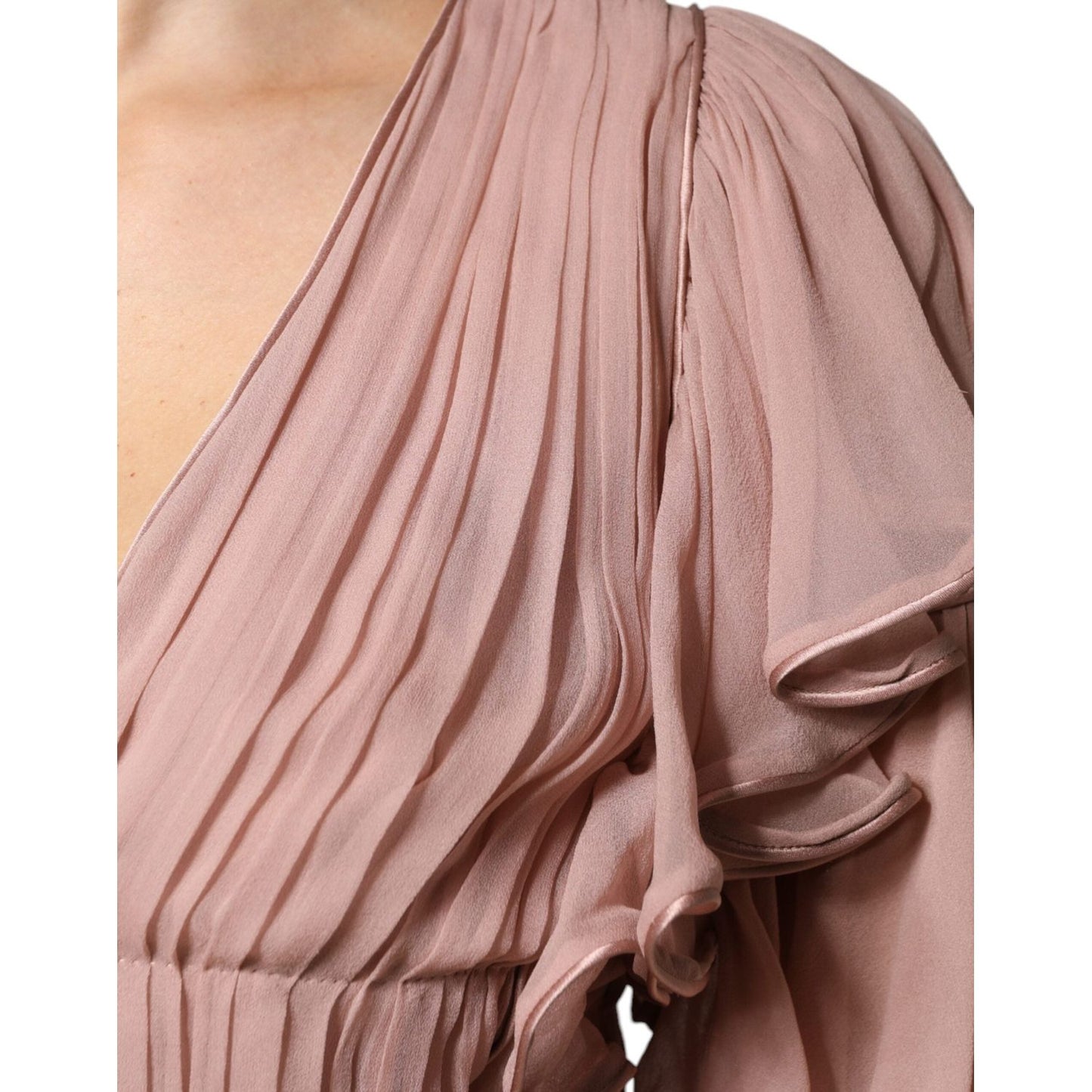 Close-up of Alberta Ferretti brown silk V-neck pleated top with short sleeves and detailed fabric texture.