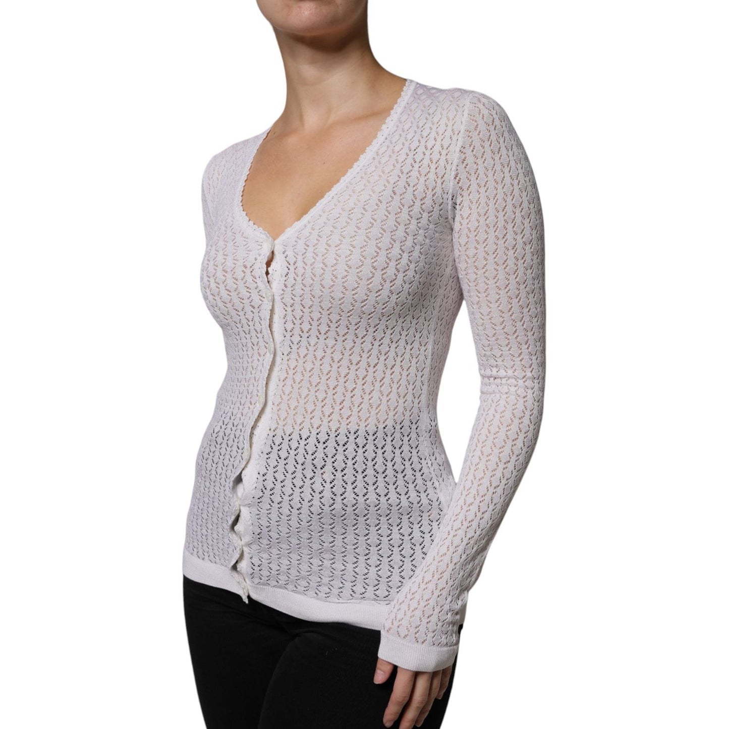 Dolce & Gabbana white silk button down cardigan sweater with v-neck and long sleeves. Lightweight knit design. Made in Italy.