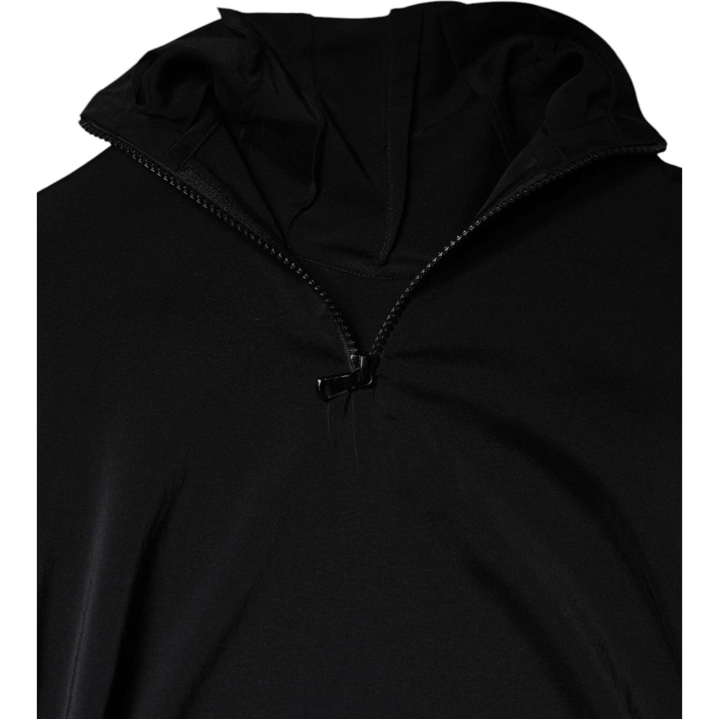 Brunello Cucinelli black silk blend blouse with long sleeves and turtle neckline, featuring pulled threads detail.