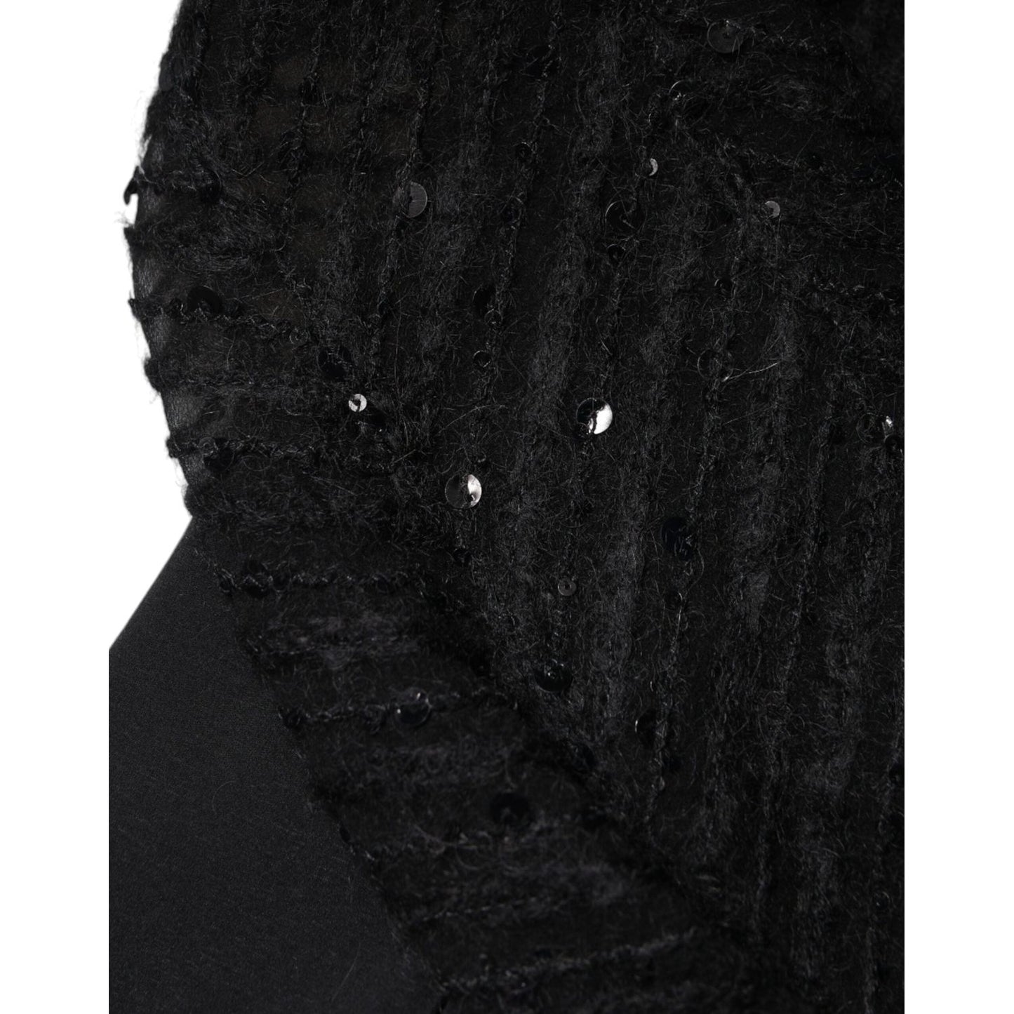 Close-up of Brunello Cucinelli black silk blend blouse top with visible texture and minor defect, showcasing luxurious fabric.