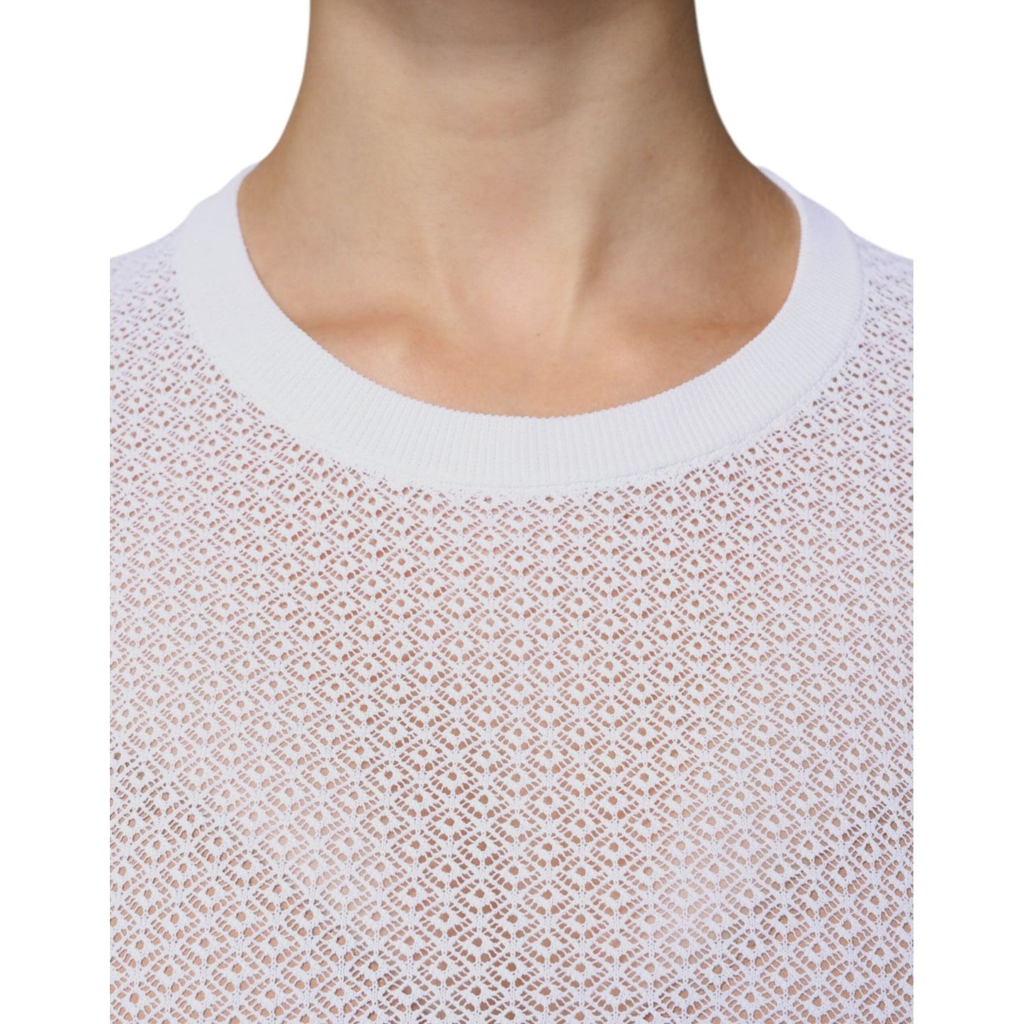 Dolce & Gabbana white mesh see-through long sleeve top close-up, featuring neckline detail with minor defect.