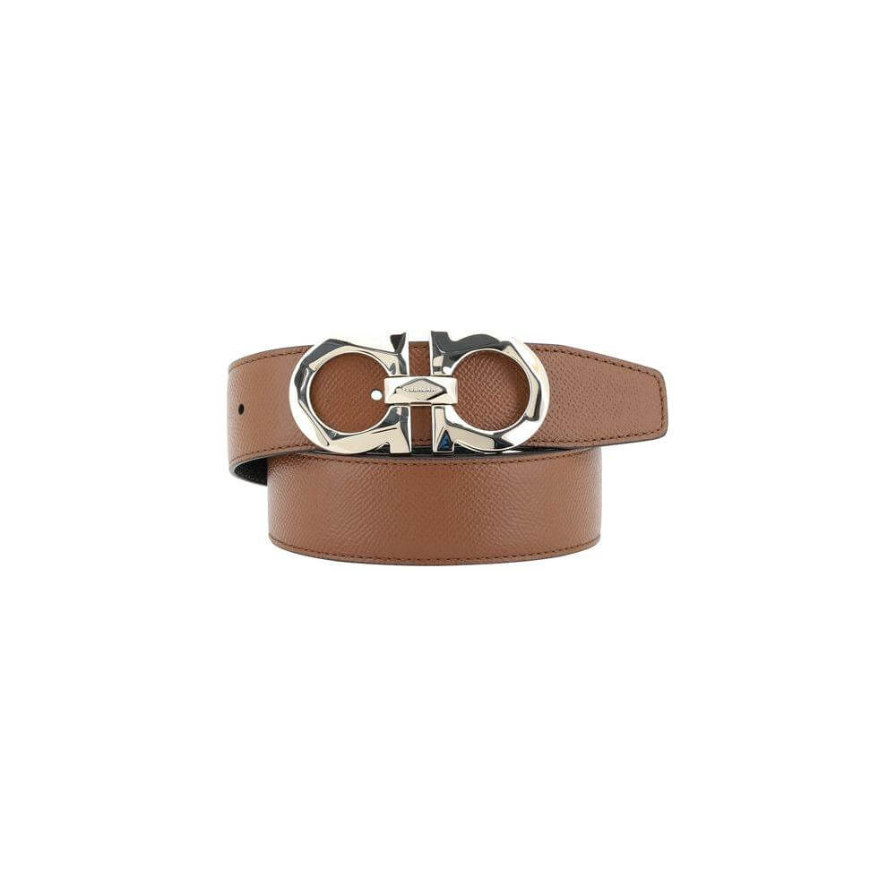 Ferragamo Gancini reversible leather belt with iconic 3D buckle, showcasing versatile monochrome grained design for style and elegance.