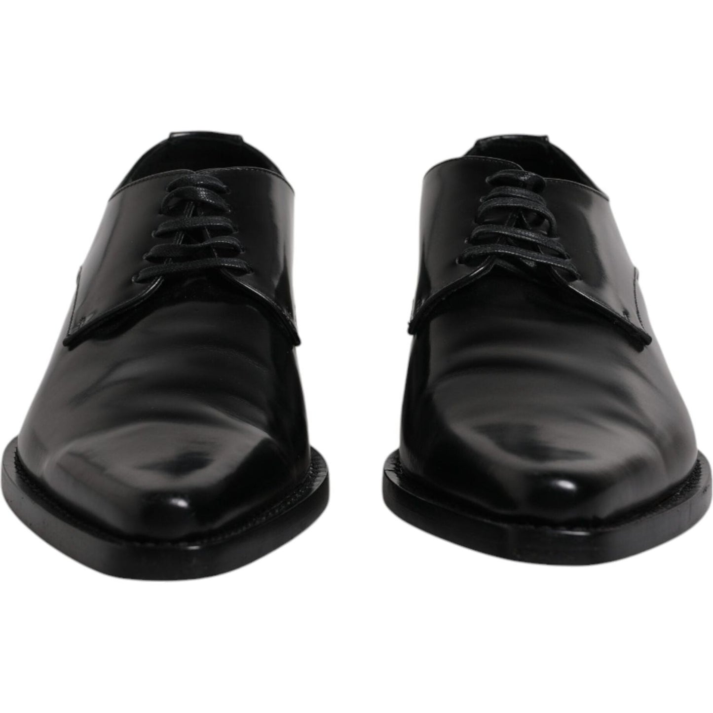 Dolce & Gabbana black patent leather derby men's dress shoes with lace-up closure, elegant design crafted in Italy, minor scratches visible.