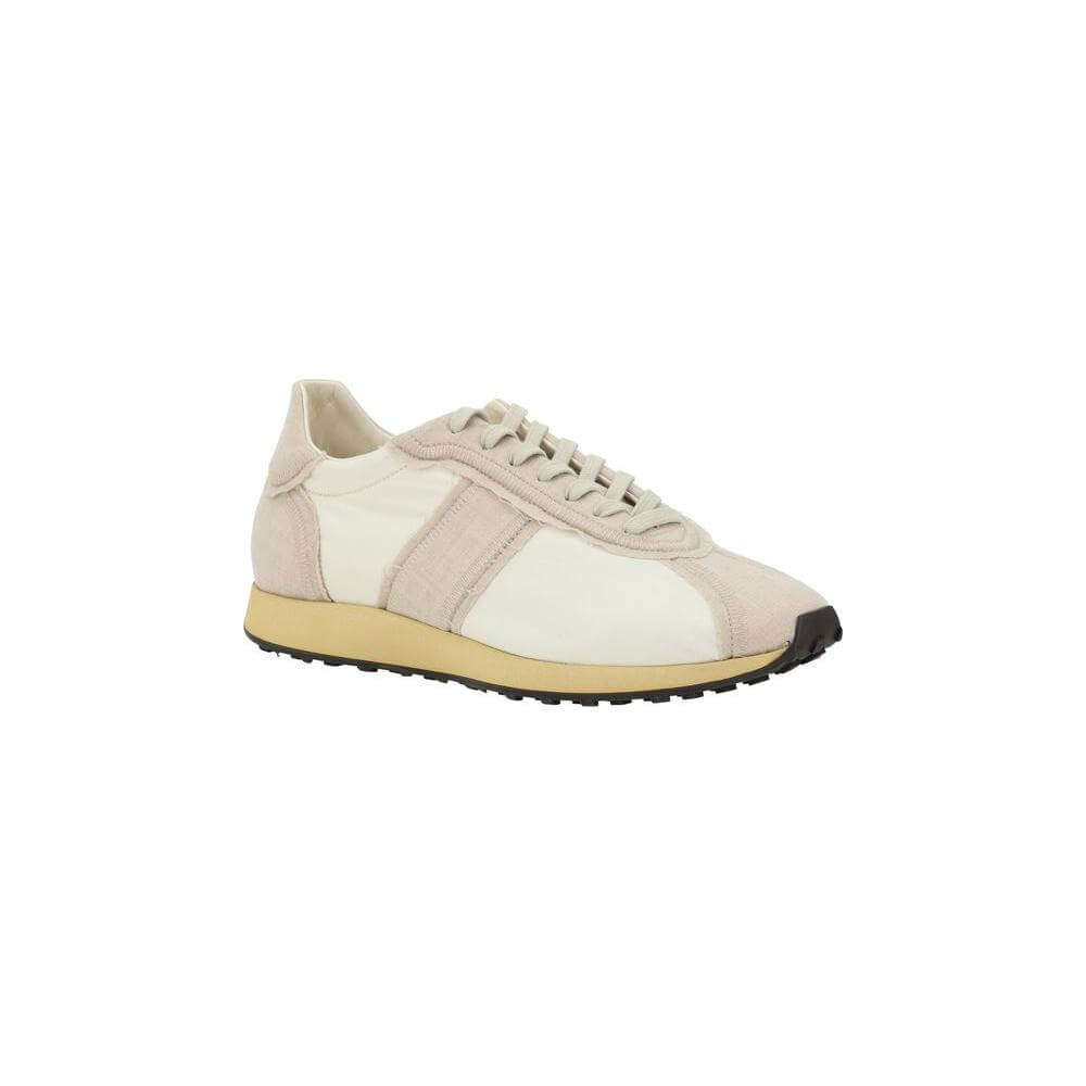 Sleek The Row Moveo Sneakers with paneled design, front lace-up closure, flat sole, and reinforced toe for style, comfort, and durability.