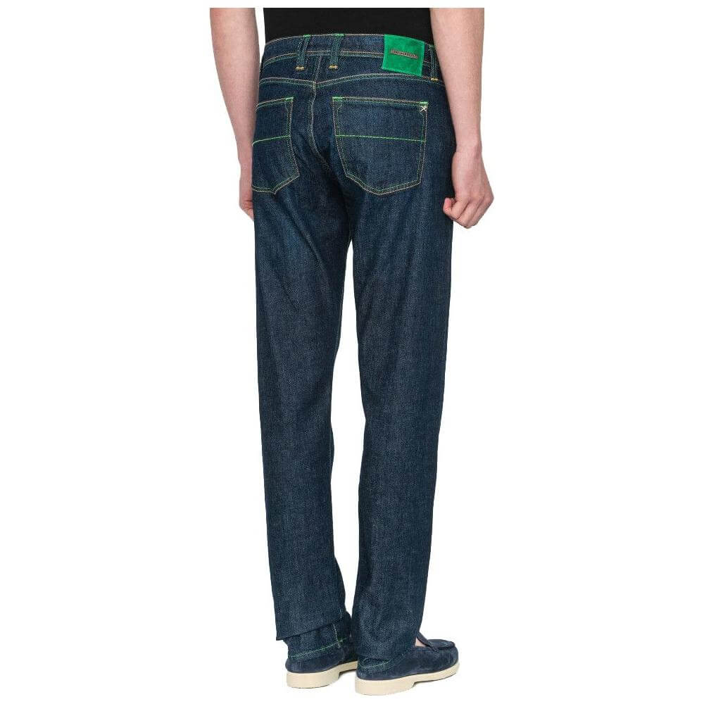 Tramarossa blue cotton jeans with green stitching, shiny green button, and bright green suede patch on the back, five-pocket style.