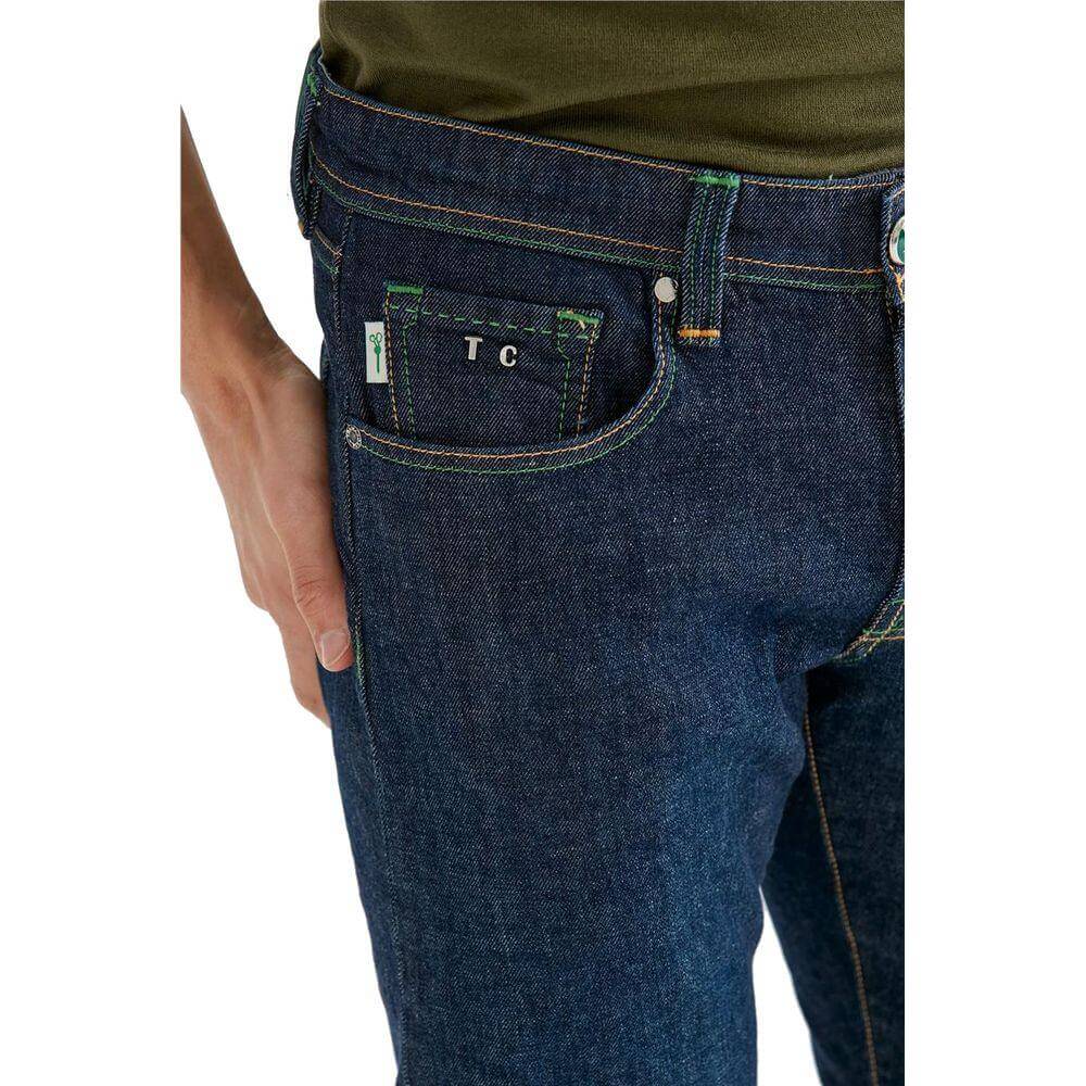Tramarossa blue cotton jeans with green stitching, shiny button, suede patch, metallic logo, and five-pocket design. Regular fit.