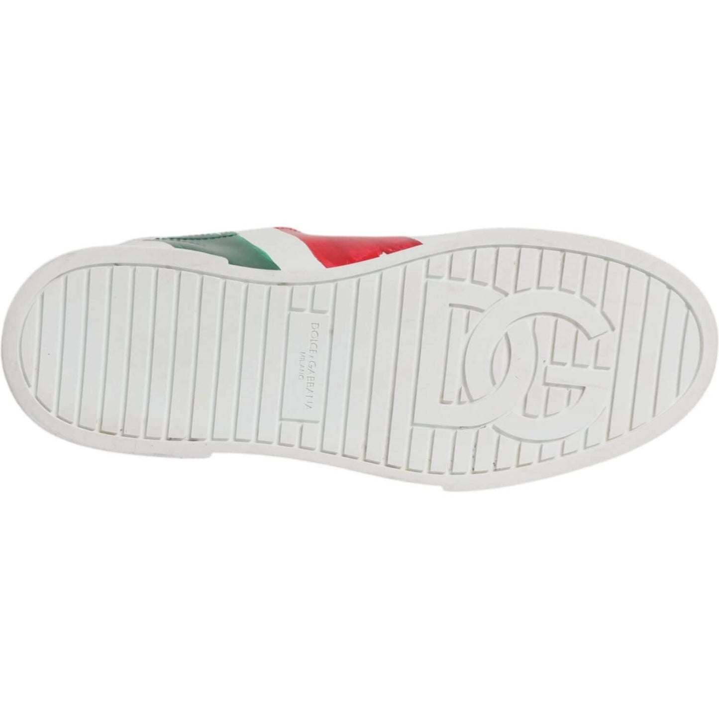 Sole of Dolce & Gabbana Portofino sneaker with logo and Italian flag design. Made from rubber, preowned, showing wear. White background.