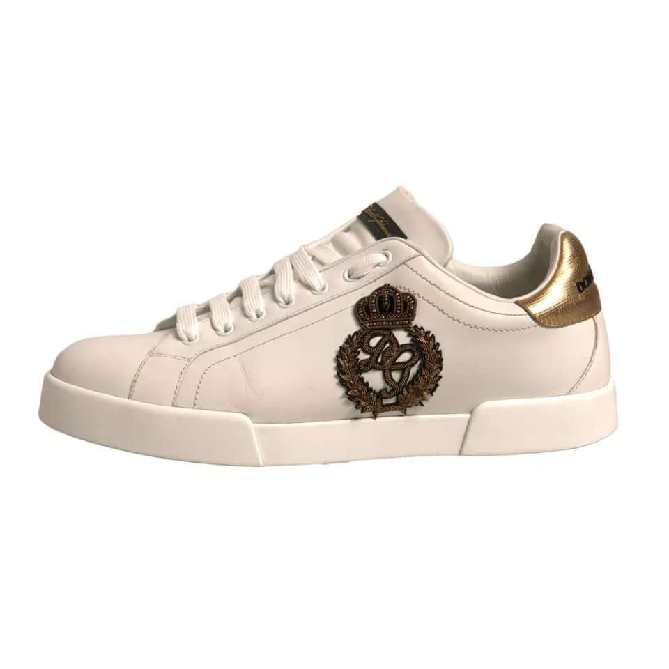 Dolce & Gabbana White Crown Patch Portofino Sneakers in white and gold calfskin, featuring lace-up design and branded logo.