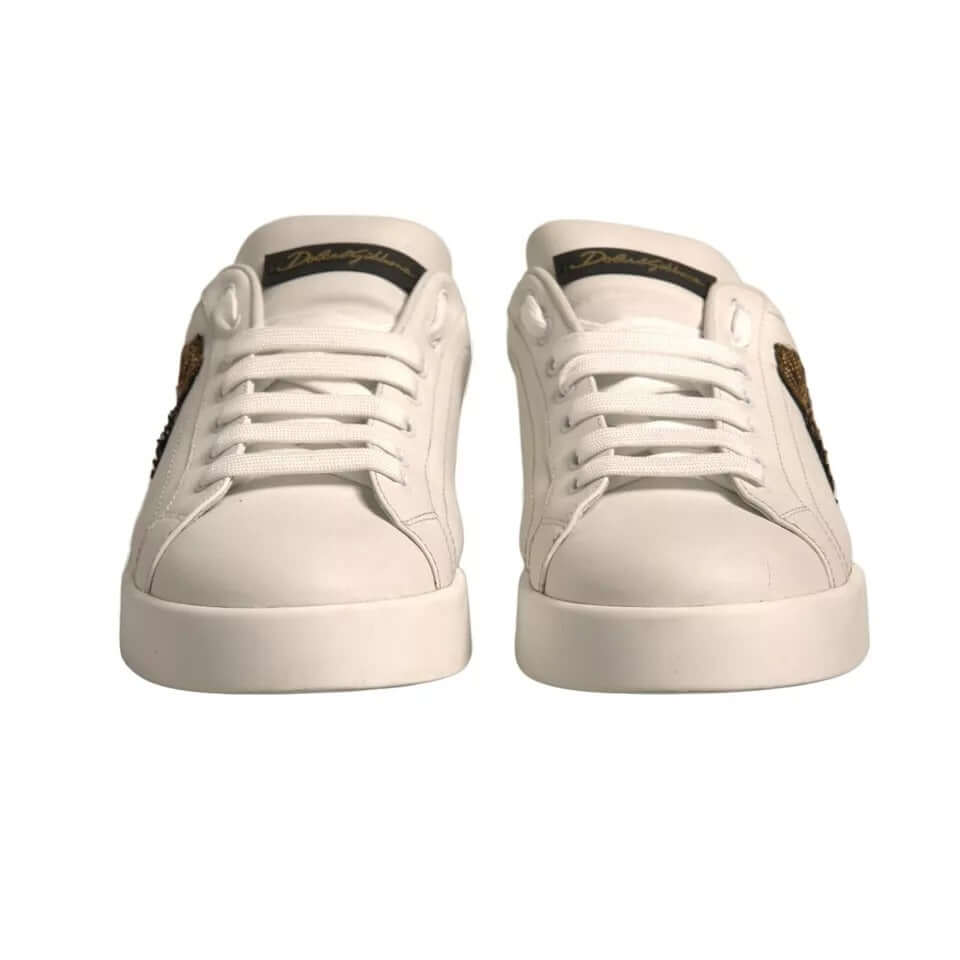 Dolce & Gabbana Portofino white sneakers, crown patch, gold-tone details, round toe, lace-up, made in Italy, front view.